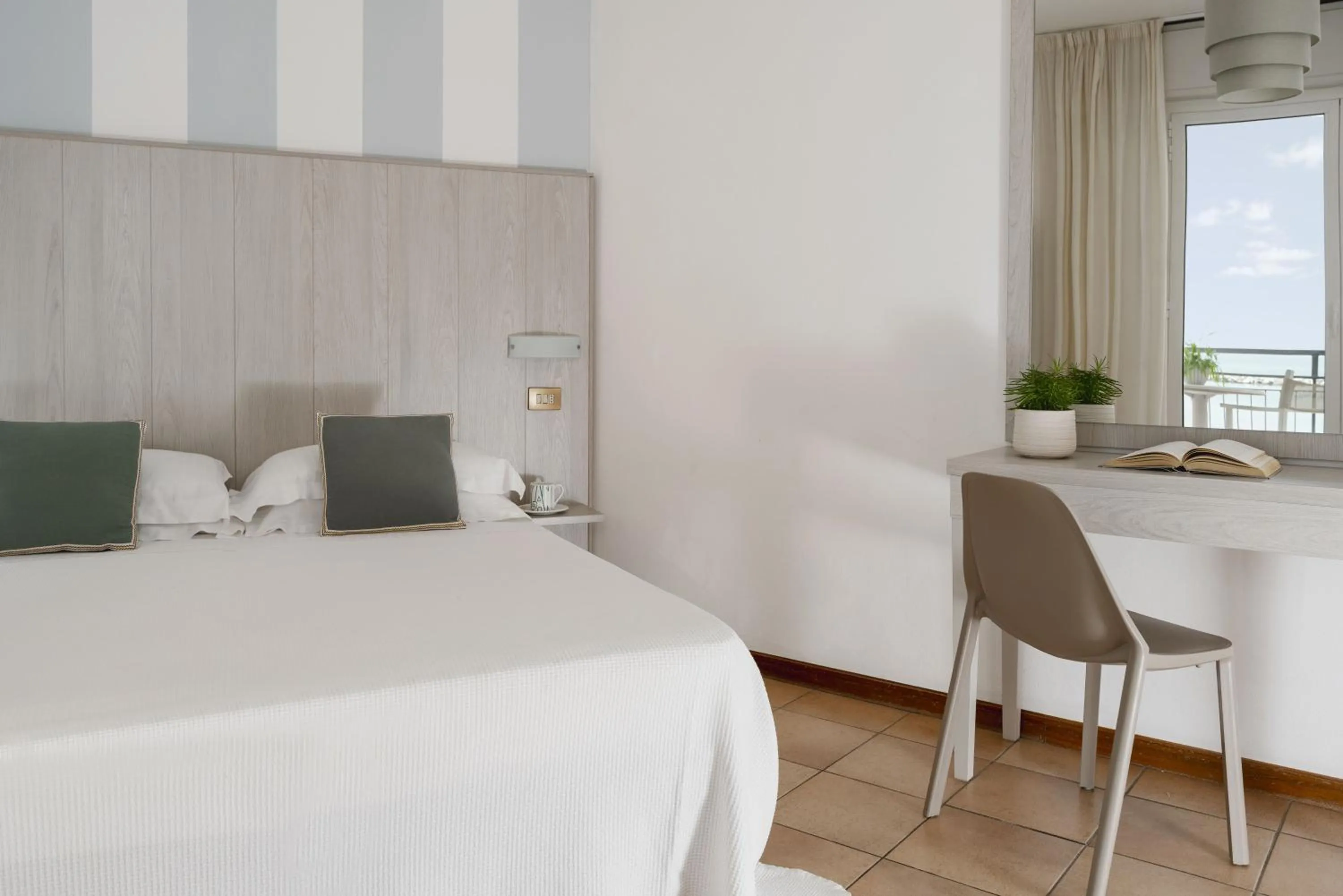 Bed in Hotel Roxy & Beach