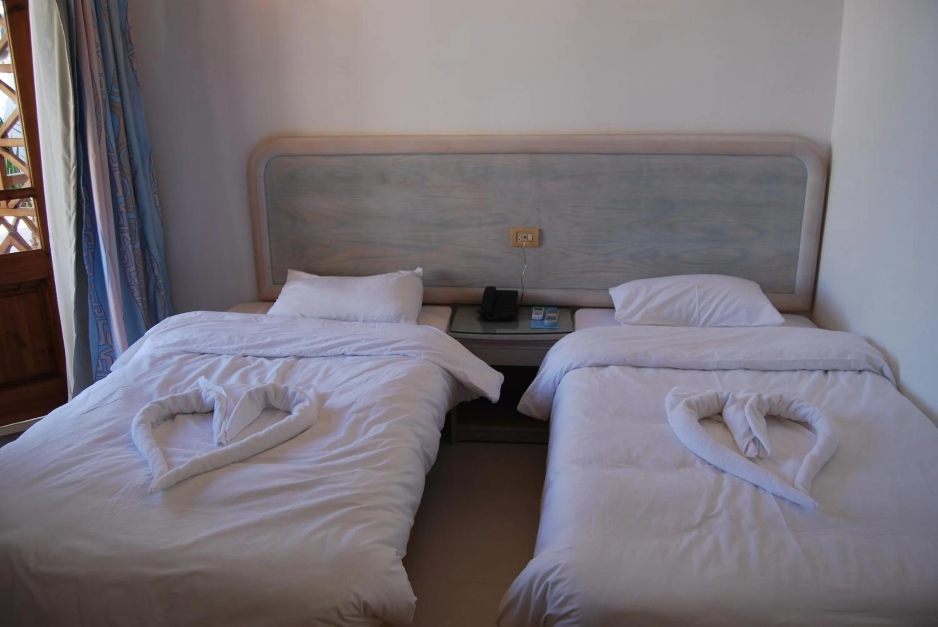 Bed in Acacia Dahab Hotel