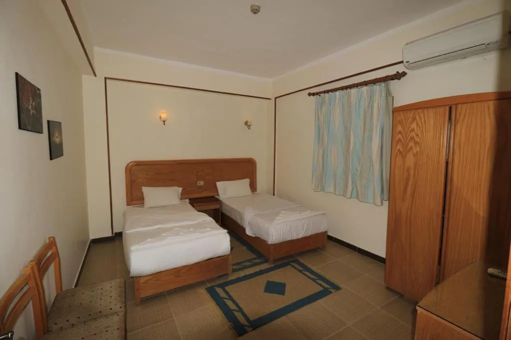 Bed in Acacia Dahab Hotel