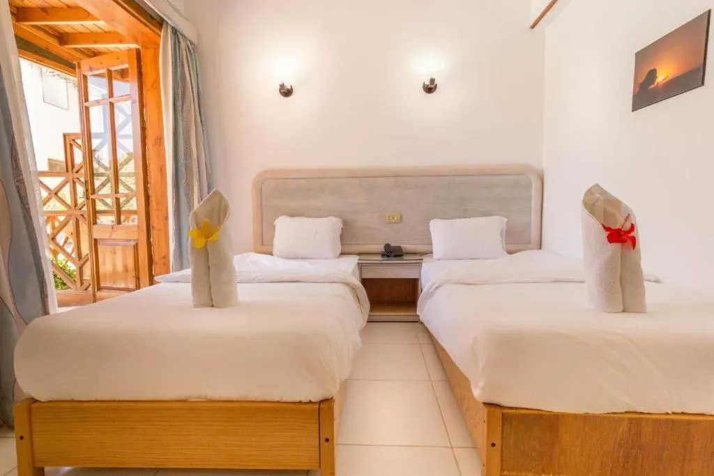 Bed in Acacia Dahab Hotel