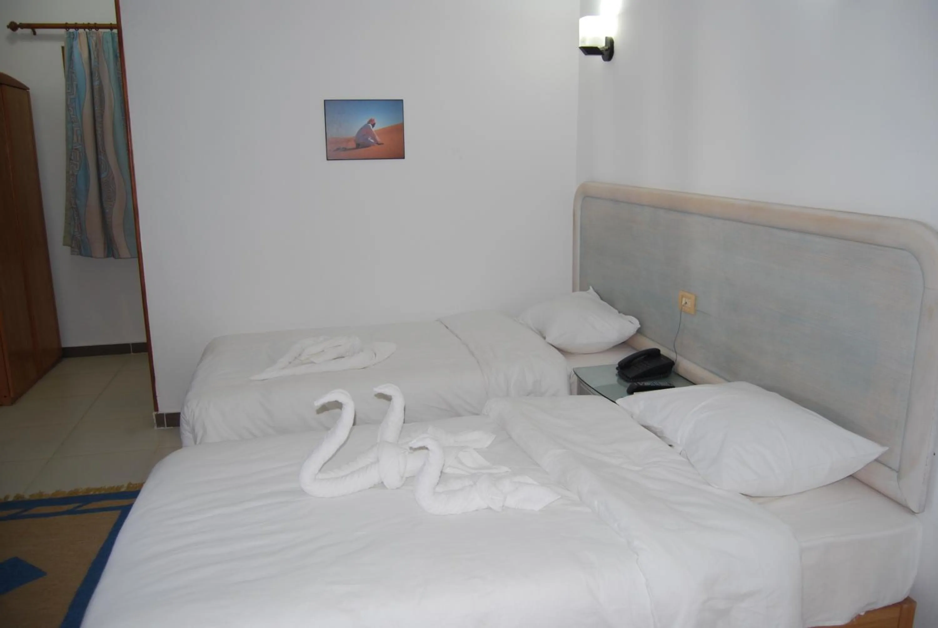 Bed in Acacia Dahab Hotel