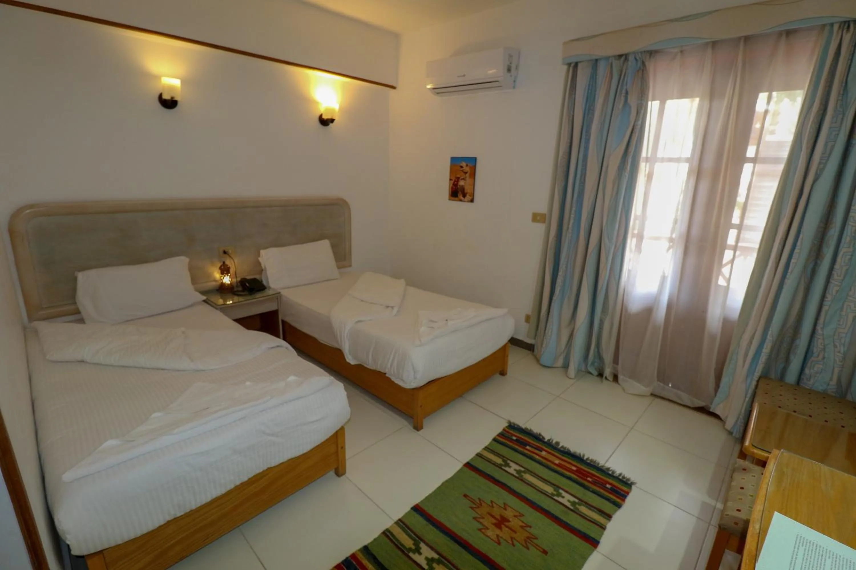 Bed in Acacia Dahab Hotel