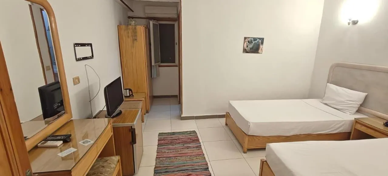 Bed in Acacia Dahab Hotel