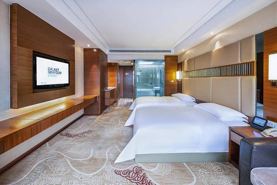 Bed in Galaxy minyoun Chengdu Hotel
