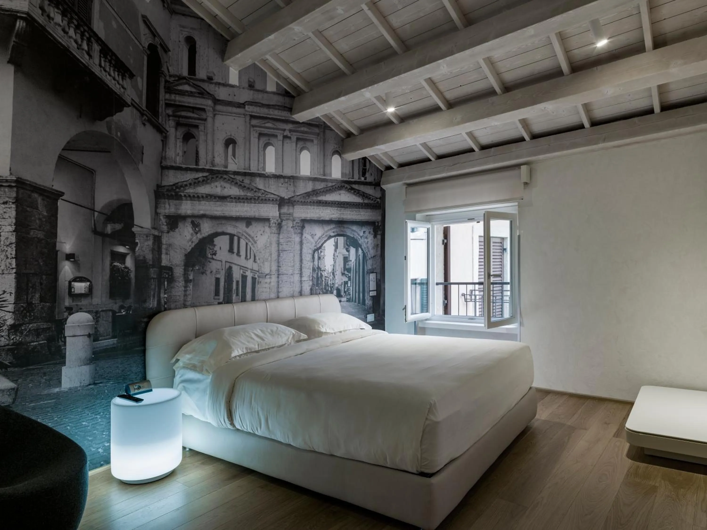 Bed in Lords of Verona Luxury Apartments