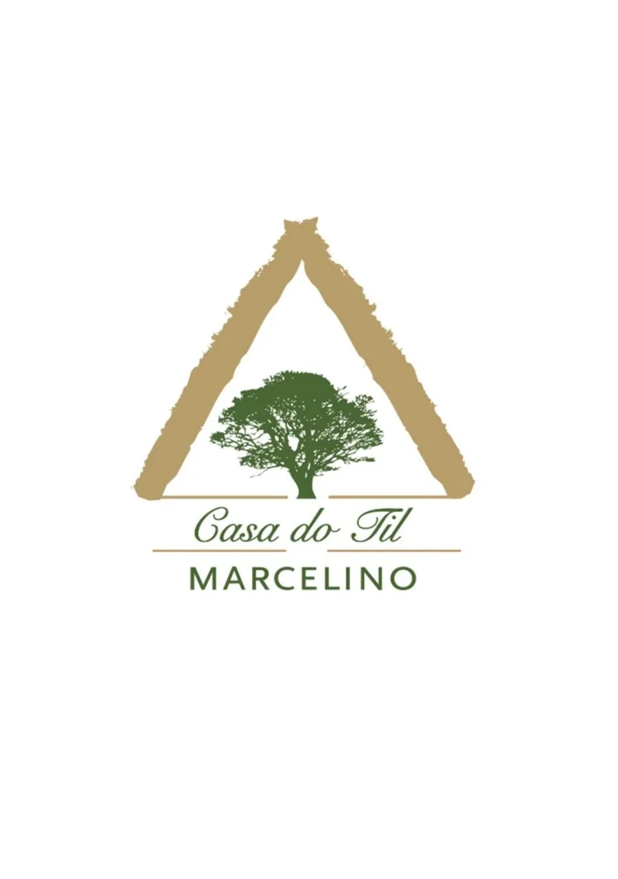 Property logo or sign in Casa do Til
