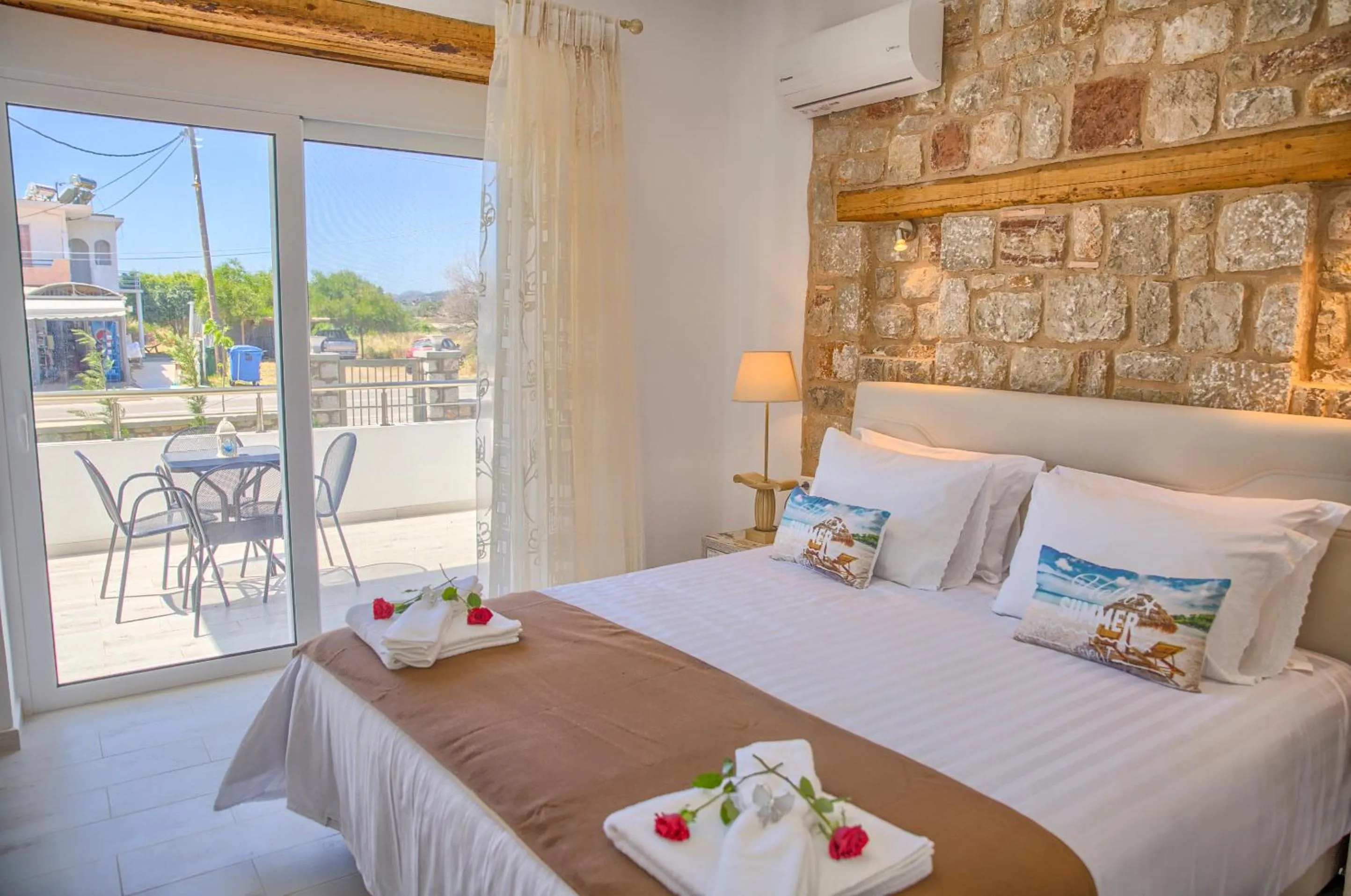 Bed in Haraki Stone Apartments