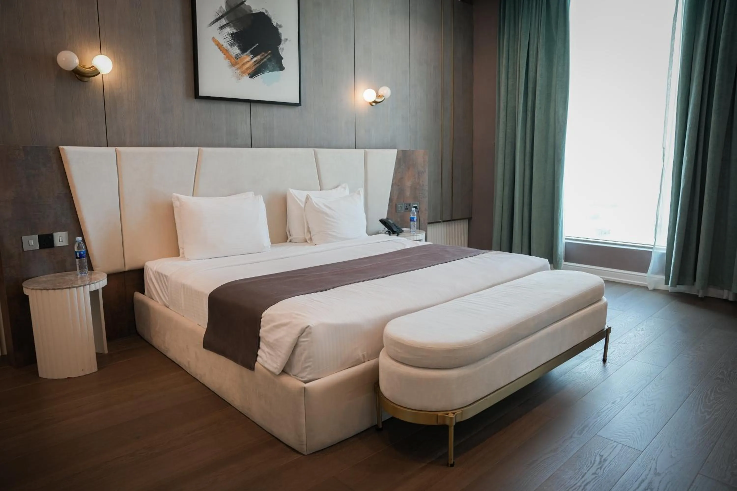 Bed in Horizon Manor Hotel