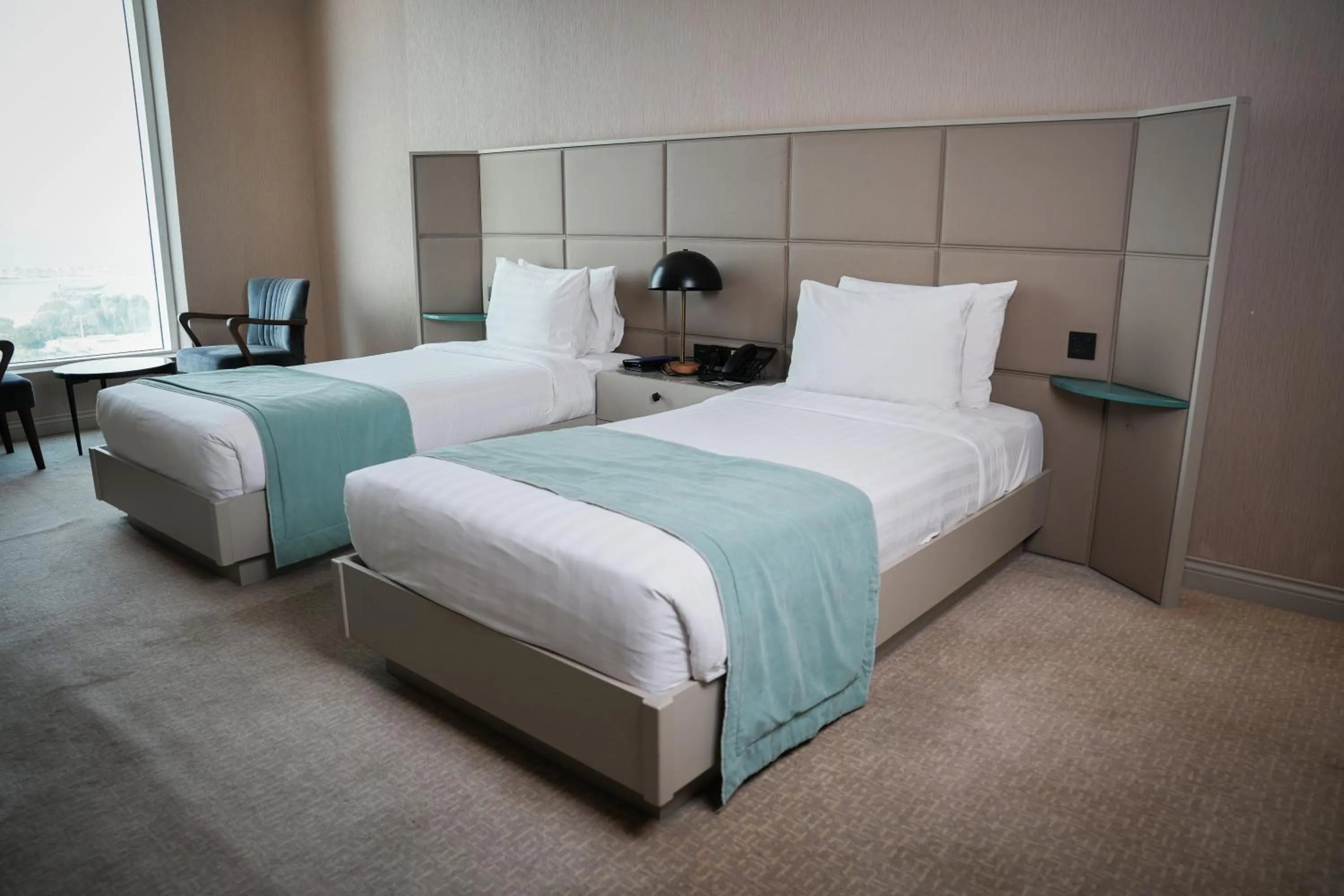 Bed in Horizon Manor Hotel