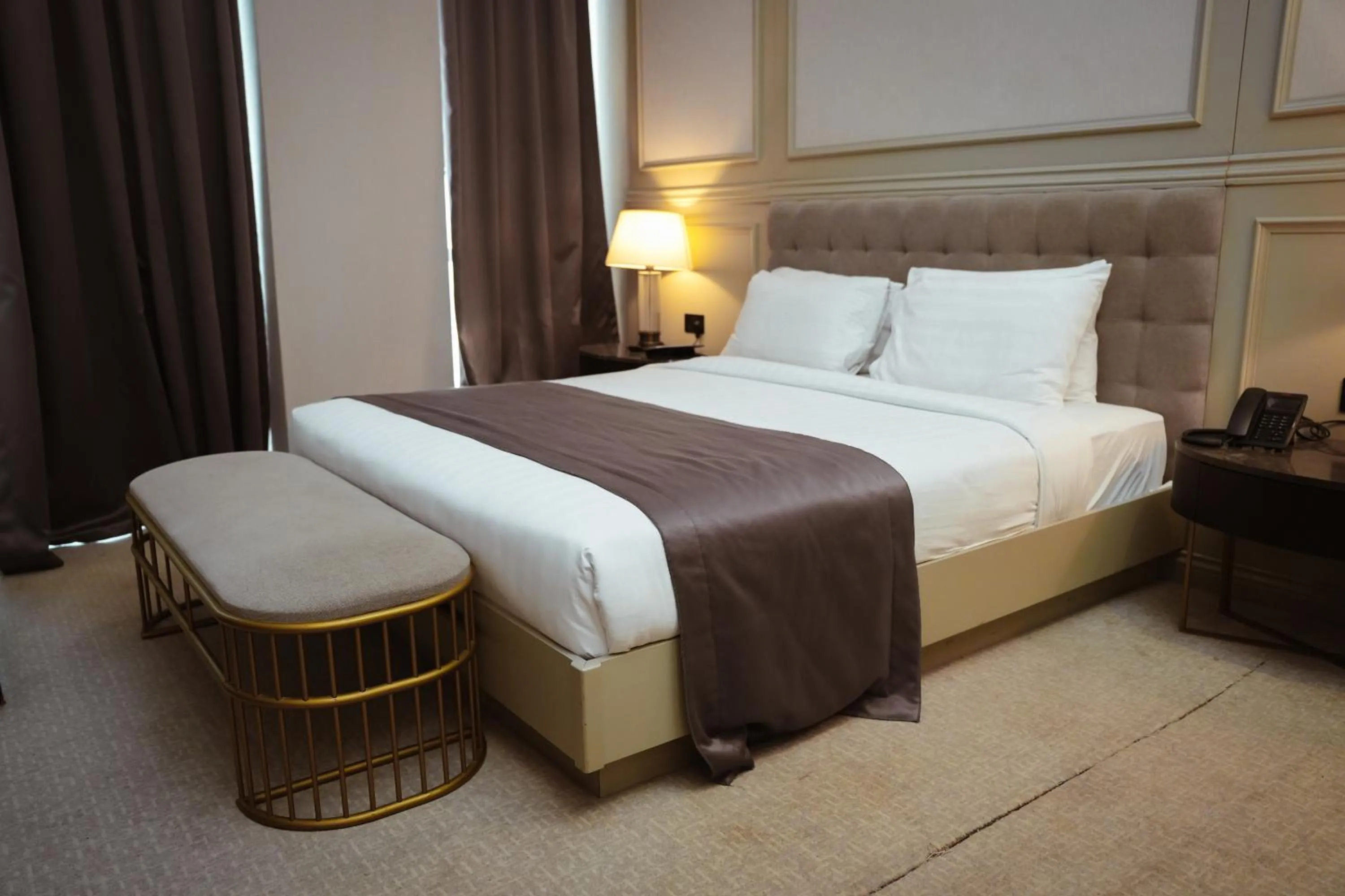 Bed in Horizon Manor Hotel