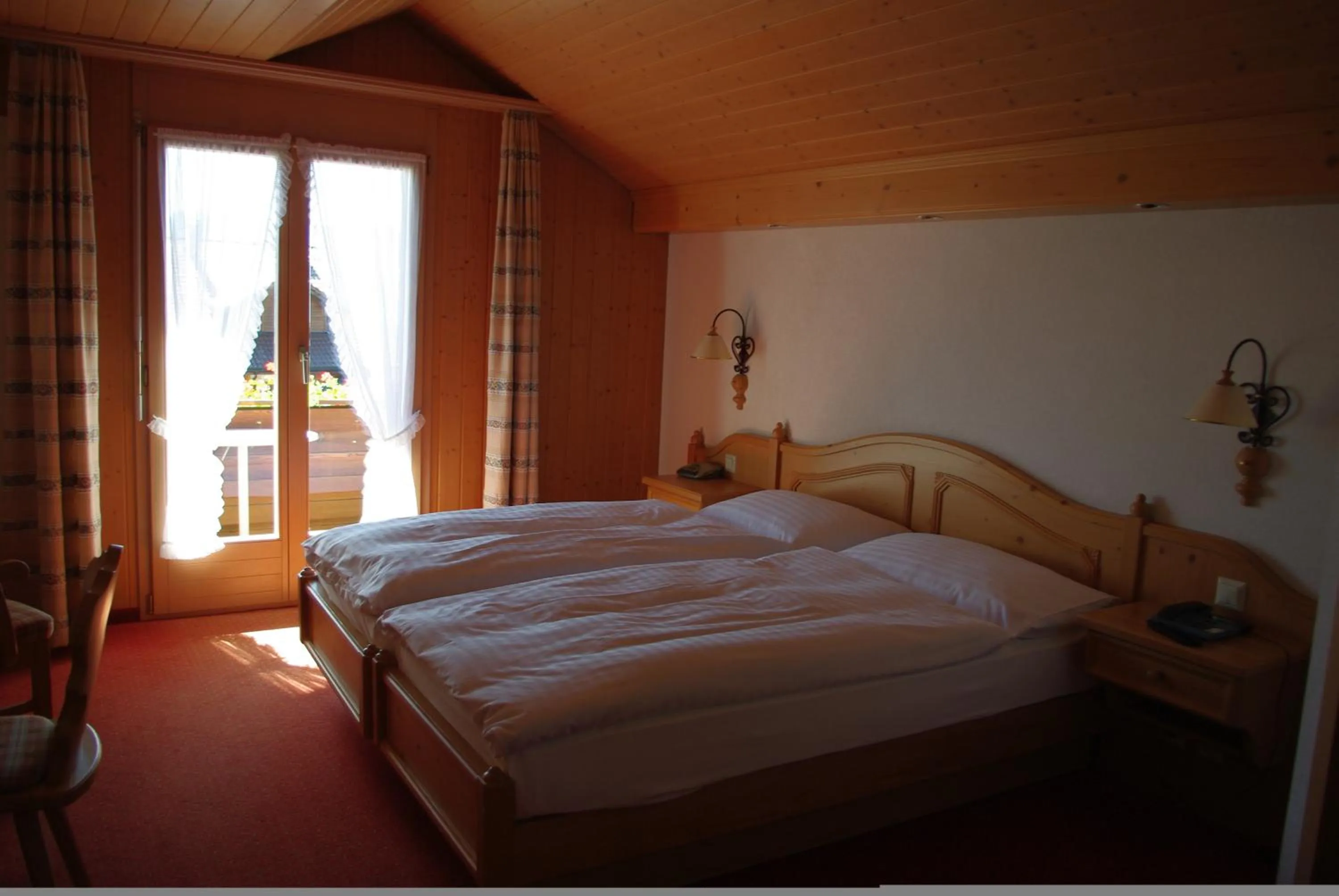 Bedroom in Hotel Adler