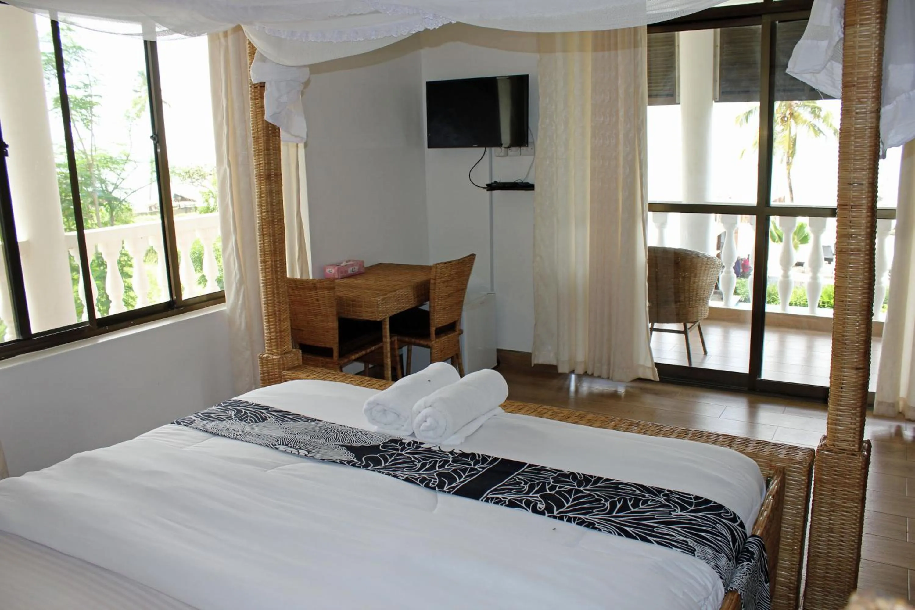 Bed in Villa Dahl Beach Resort
