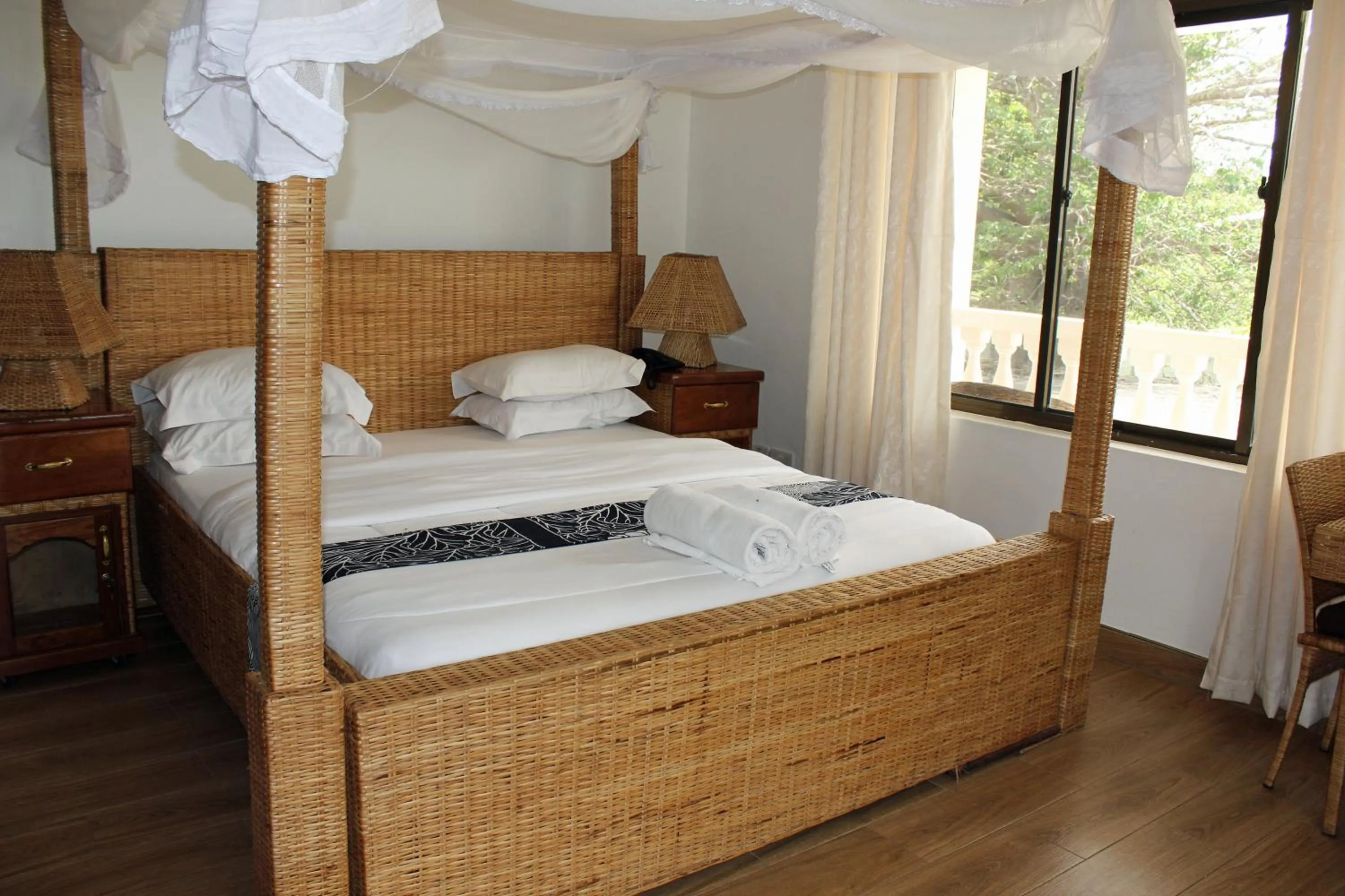 Bed in Villa Dahl Beach Resort
