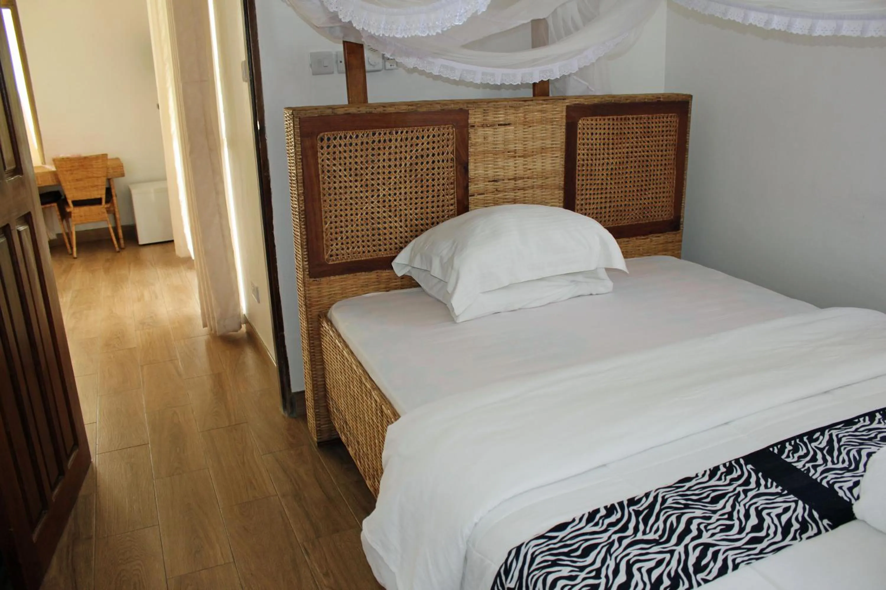 Bed in Villa Dahl Beach Resort