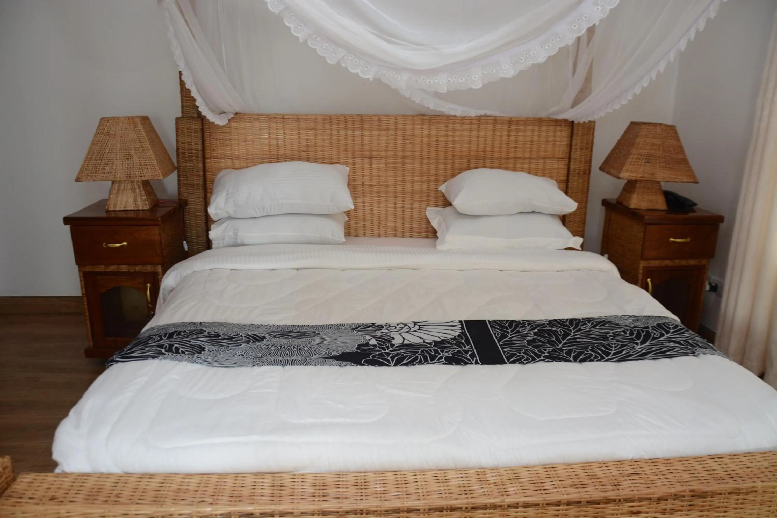 Bed in Villa Dahl Beach Resort