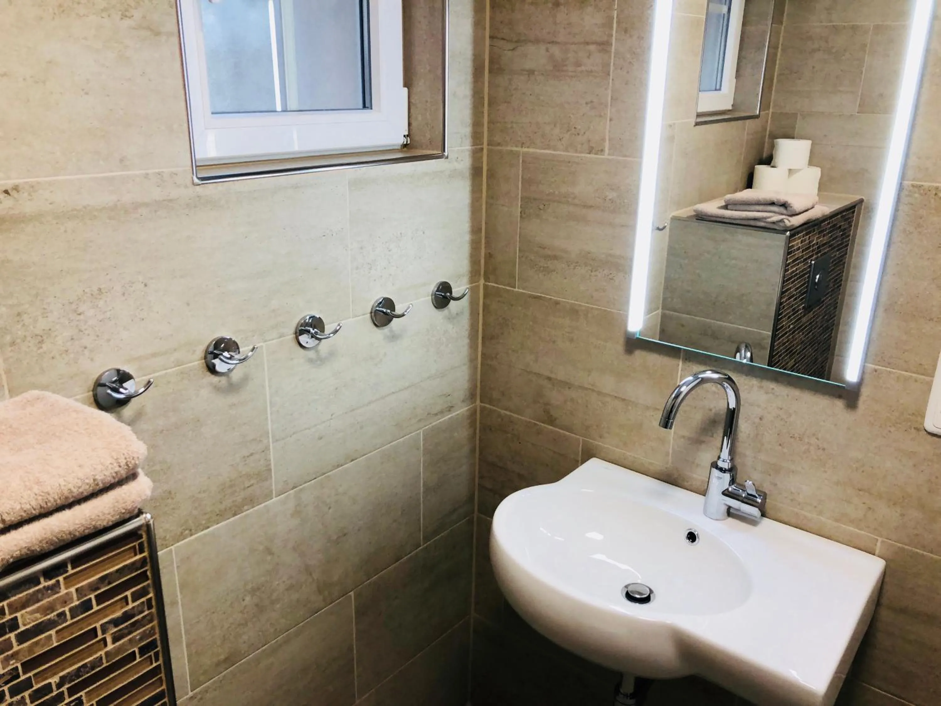 Toilet in Wilsmann Apartmentvermietung