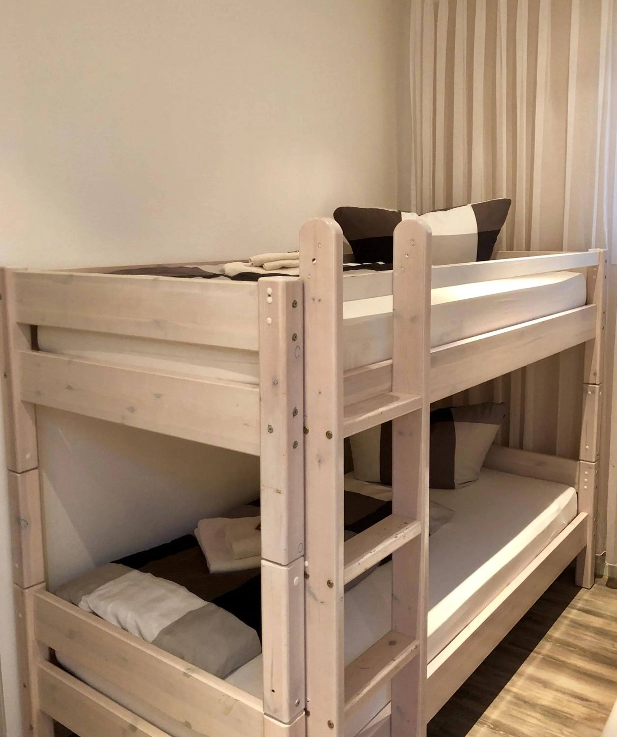 Photo of the whole room, Bed in Wilsmann Apartmentvermietung