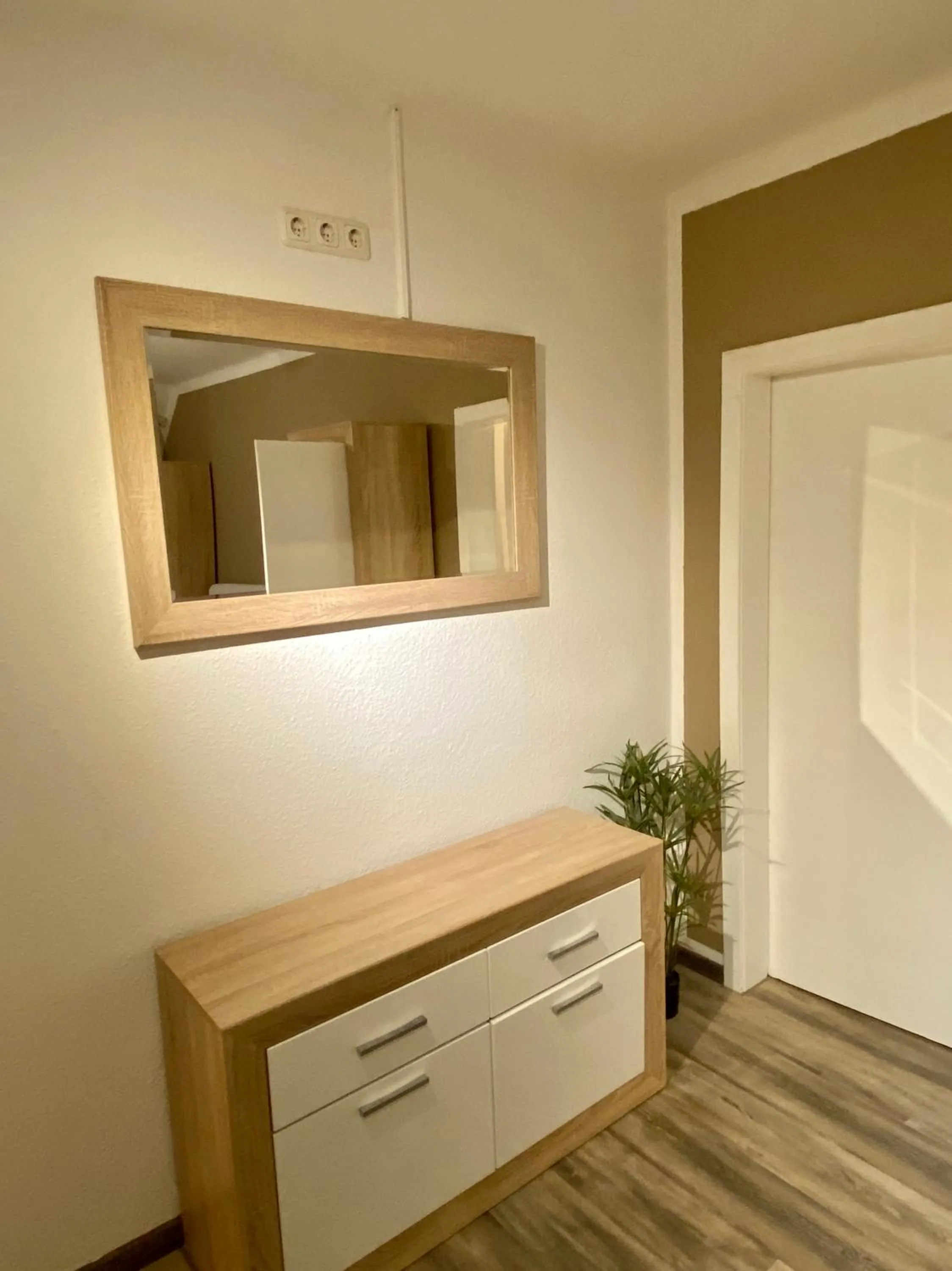 Communal lounge/ TV room in Wilsmann Apartmentvermietung