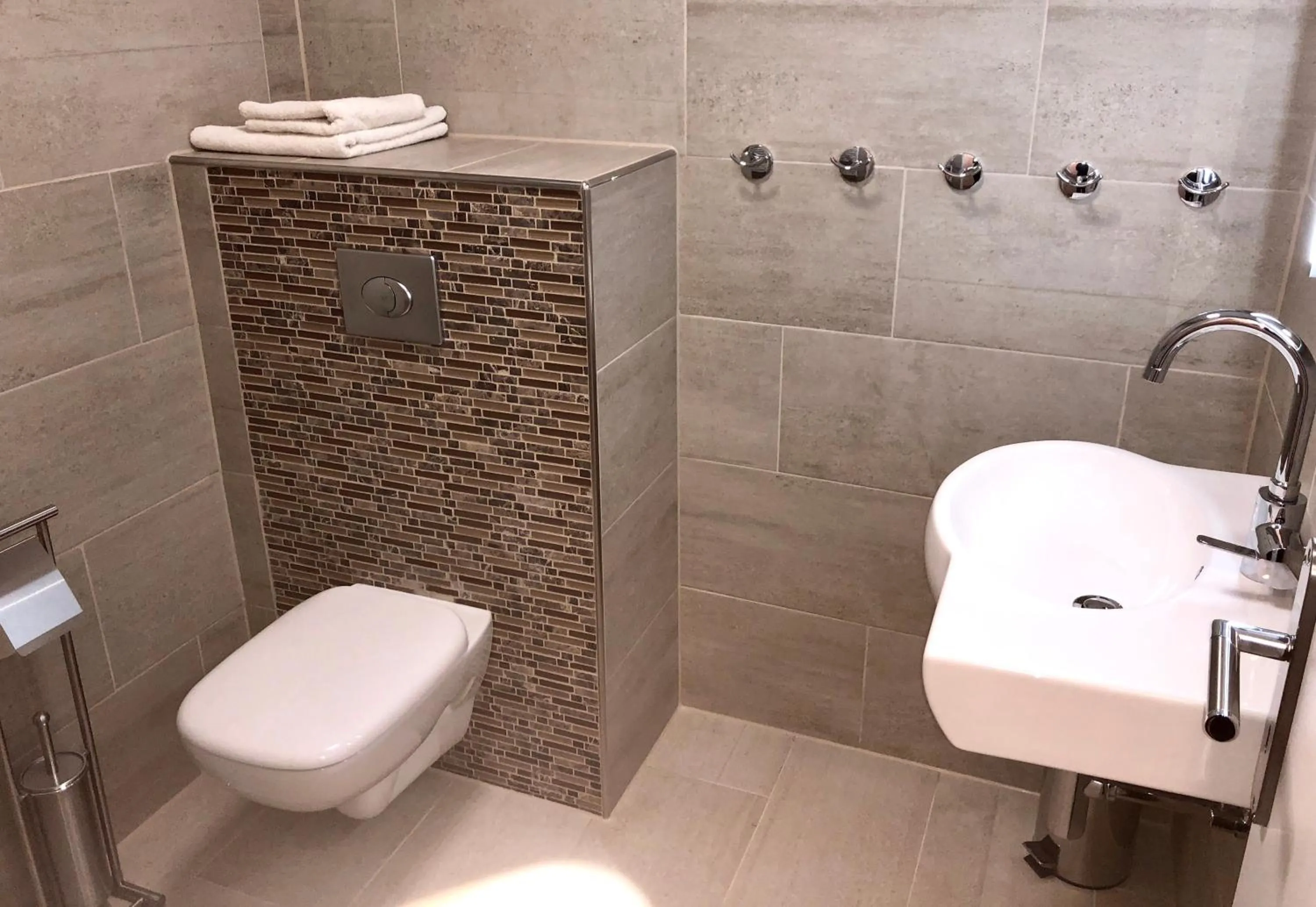 Toilet in Wilsmann Apartmentvermietung