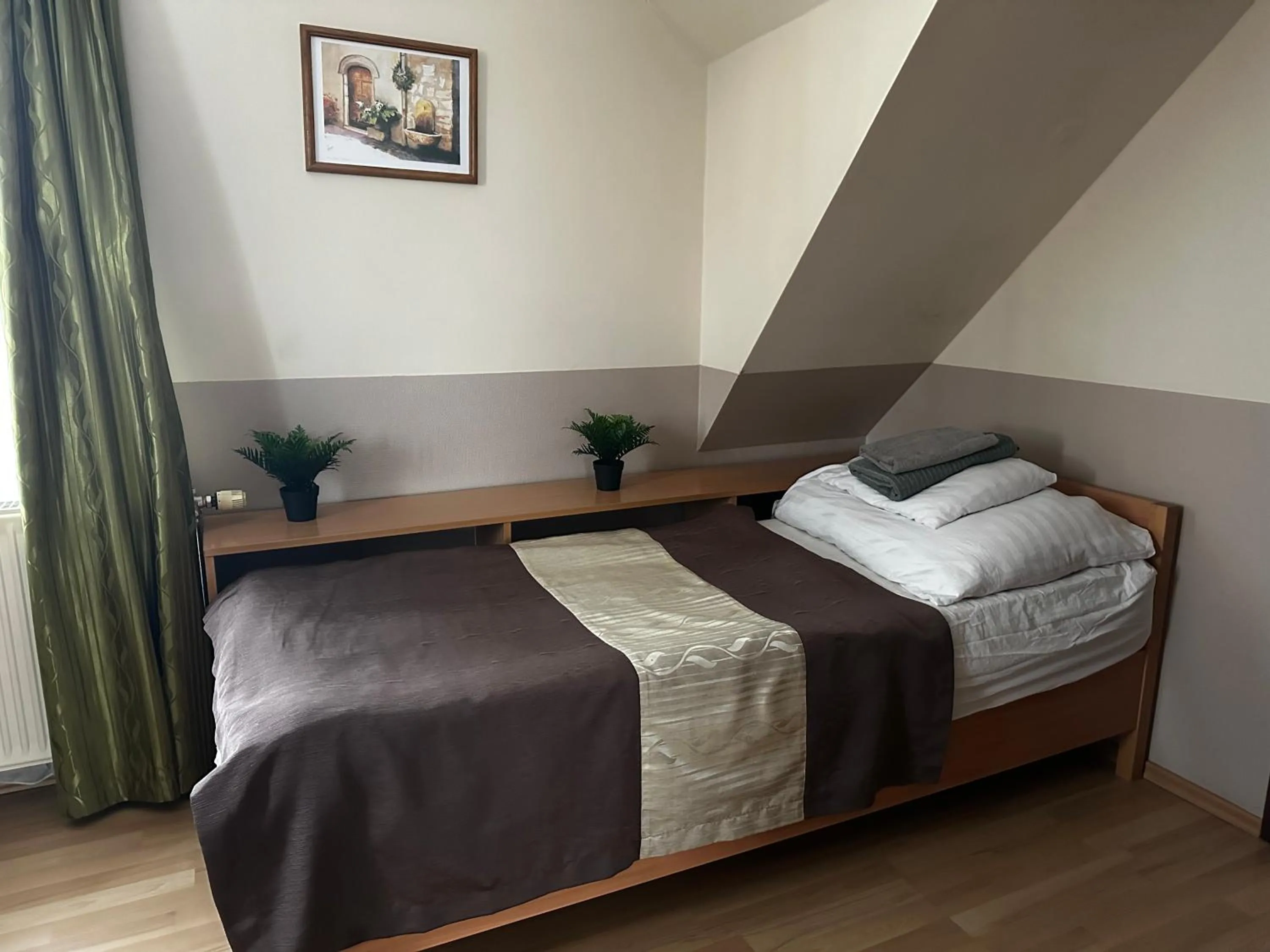 Bed in Gyarmati Panzió & Étterem