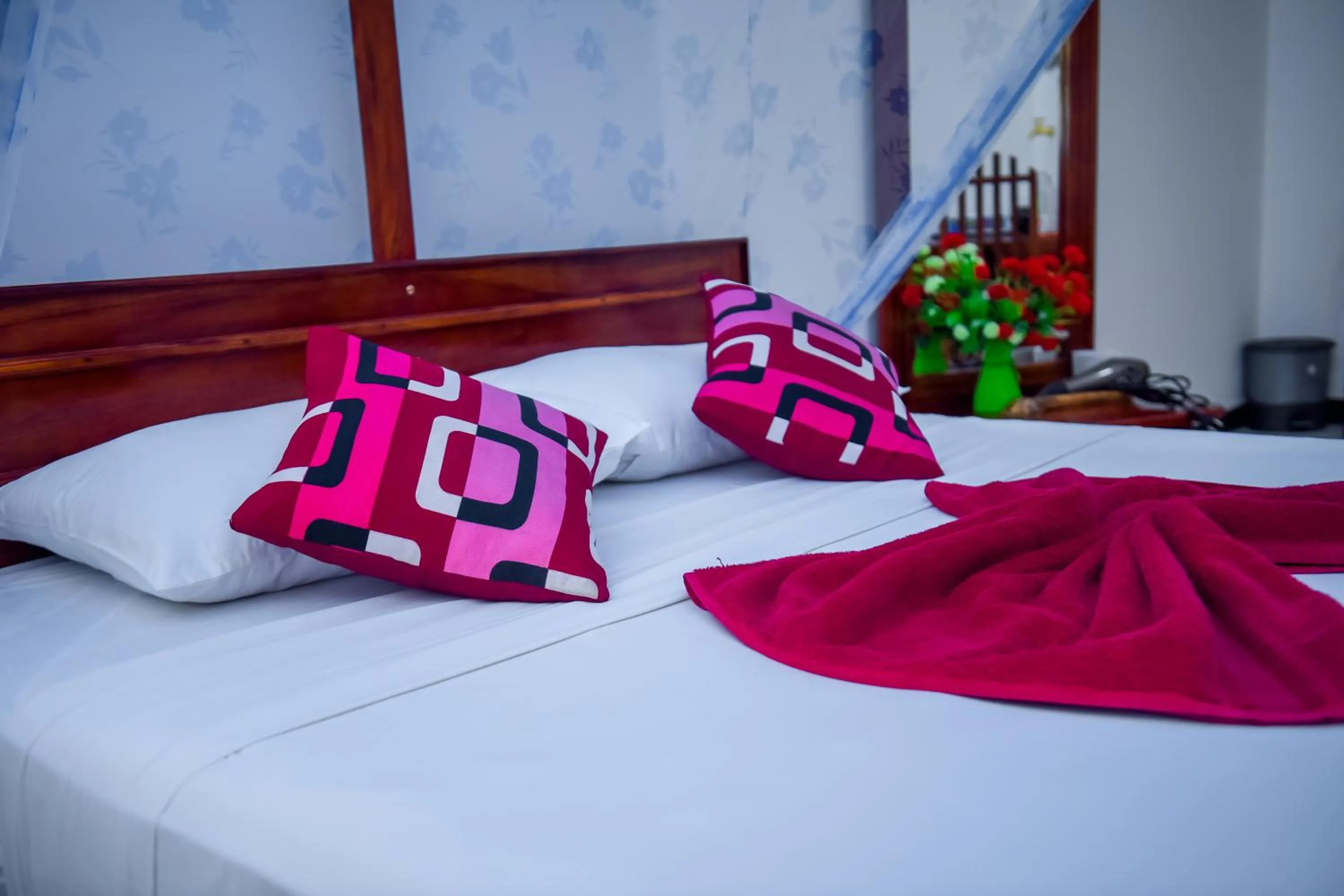 Bed in Nehansa Resort and safari