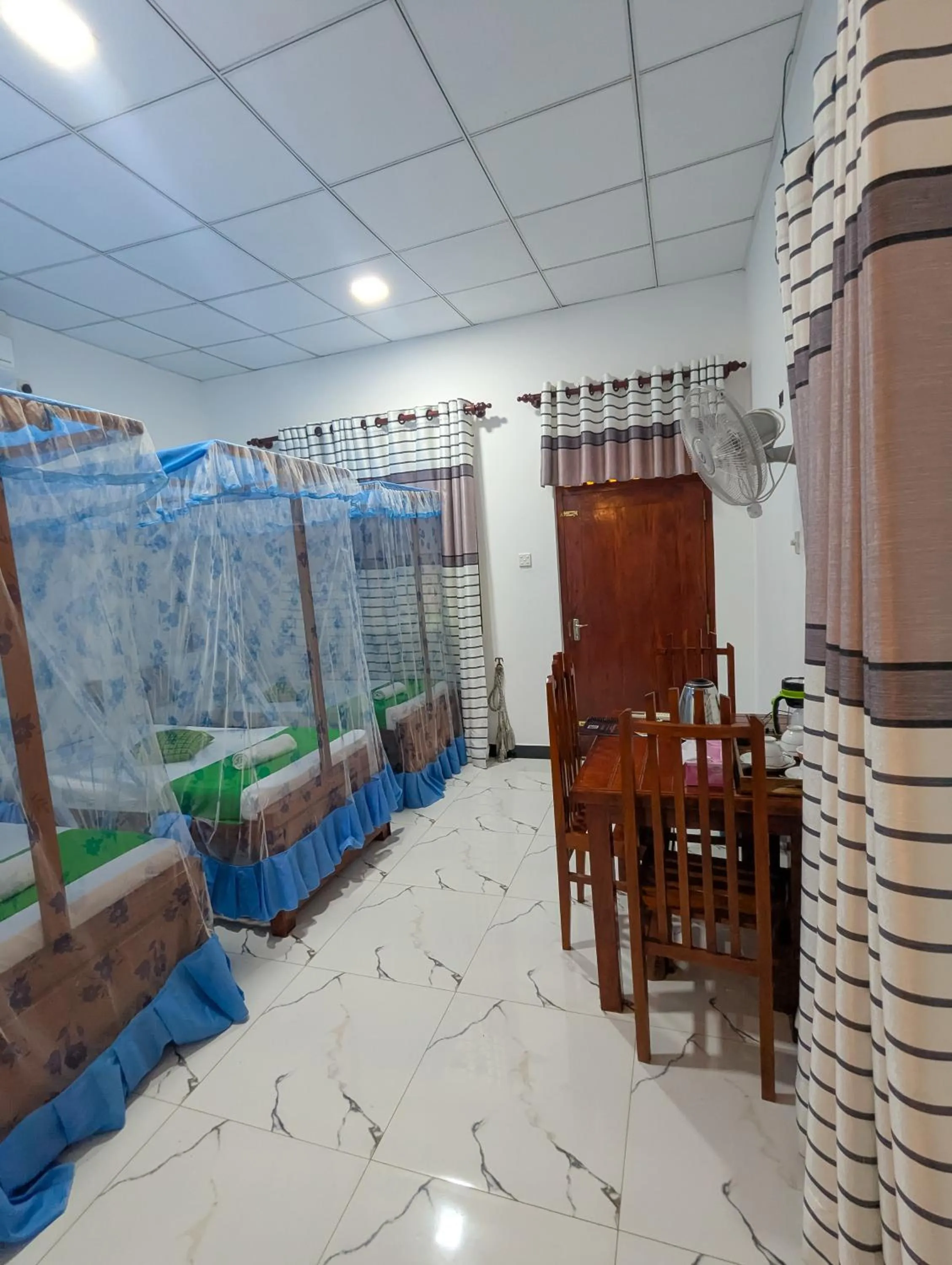 Bed in Nehansa Resort and safari