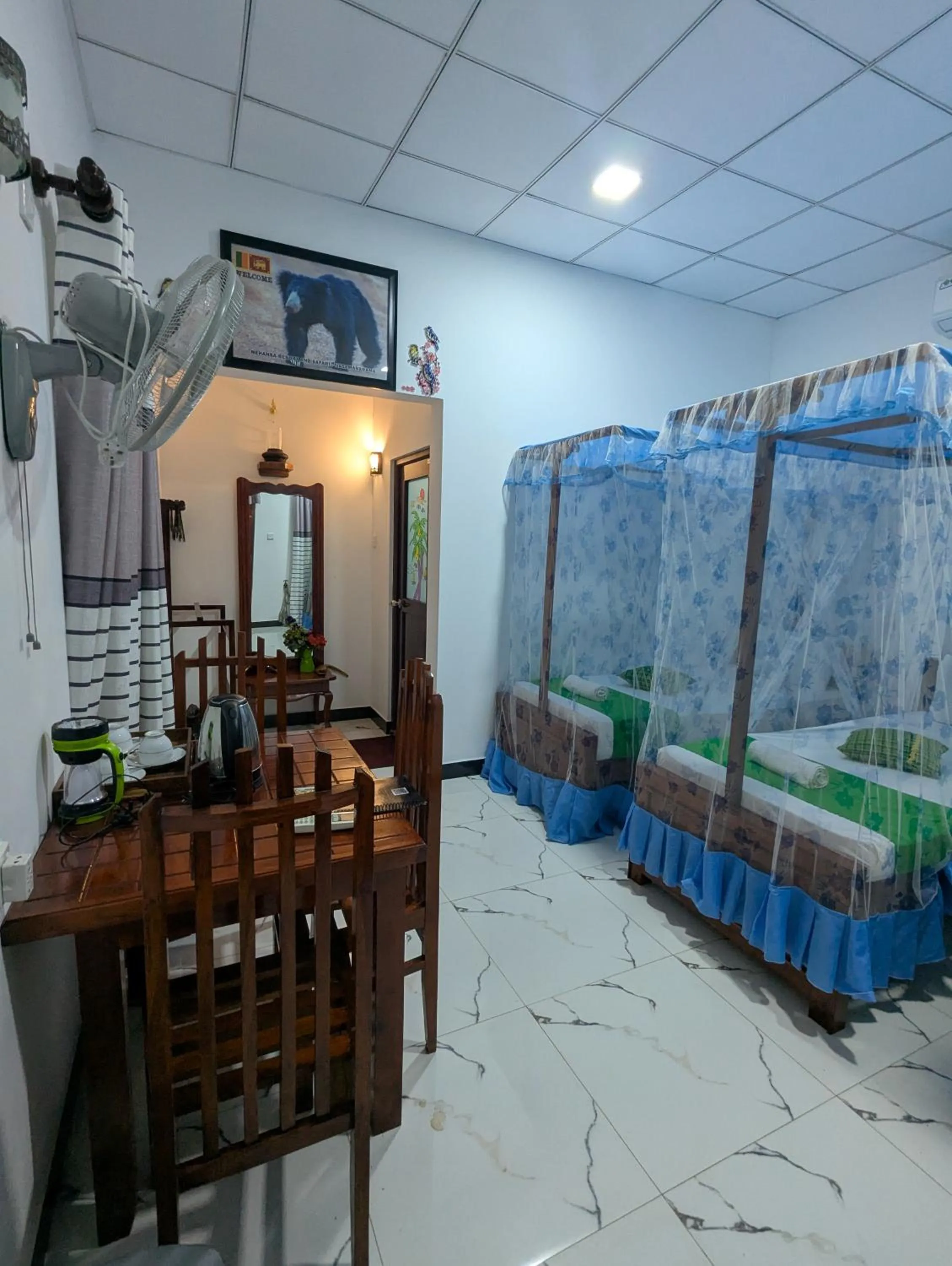 Bed in Nehansa Resort and safari