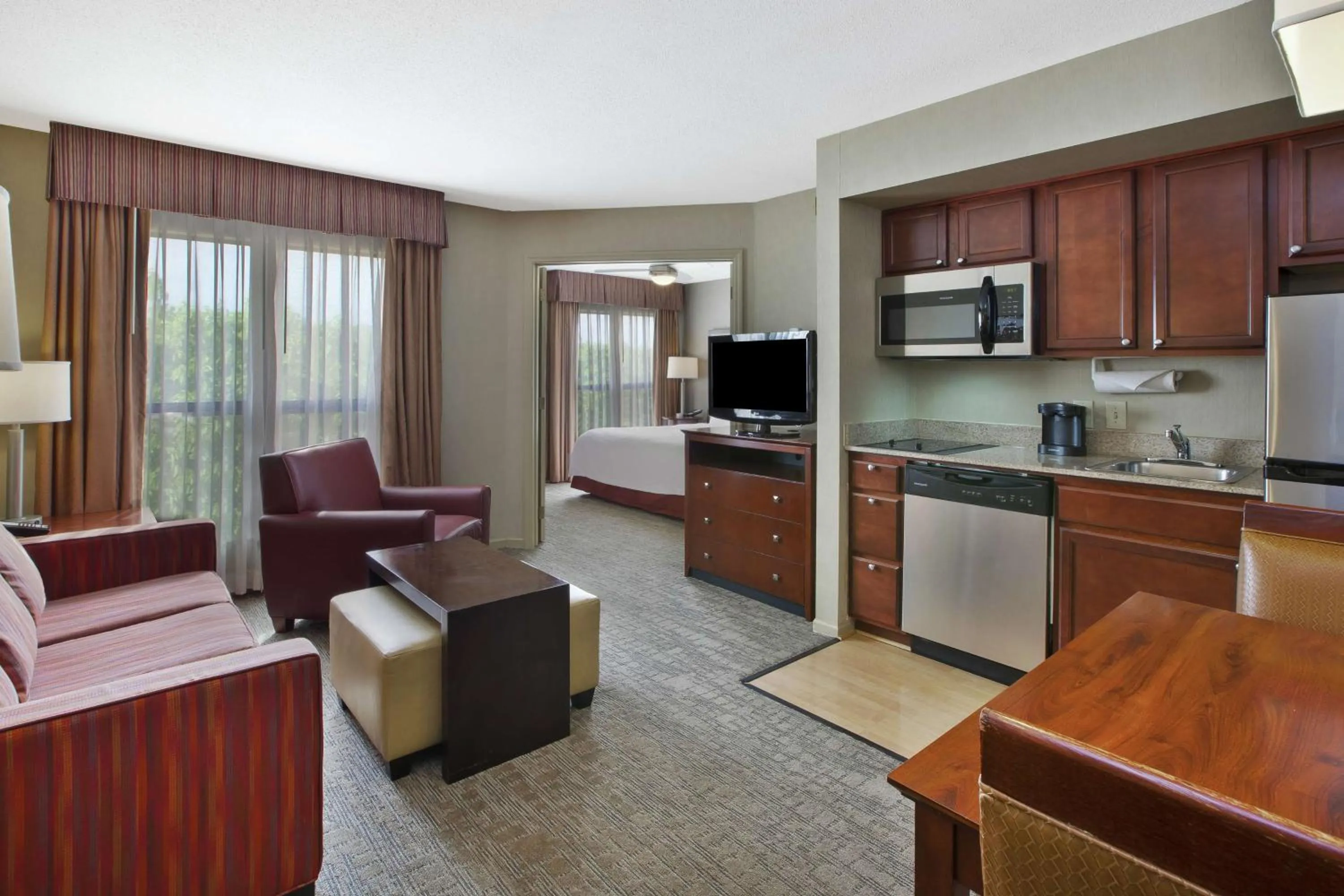 Bedroom, Kitchen/Kitchenette in Homewood Suites Dayton-Fairborn