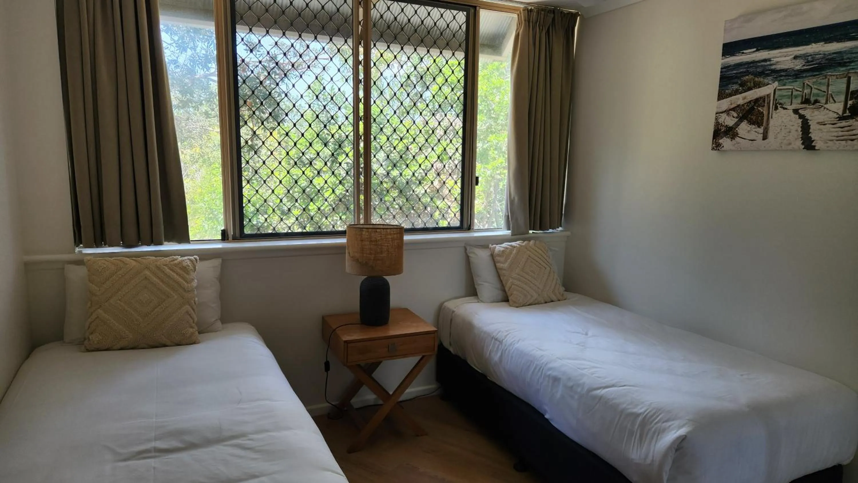 Bed in Whalewatch Ocean Beach Resort