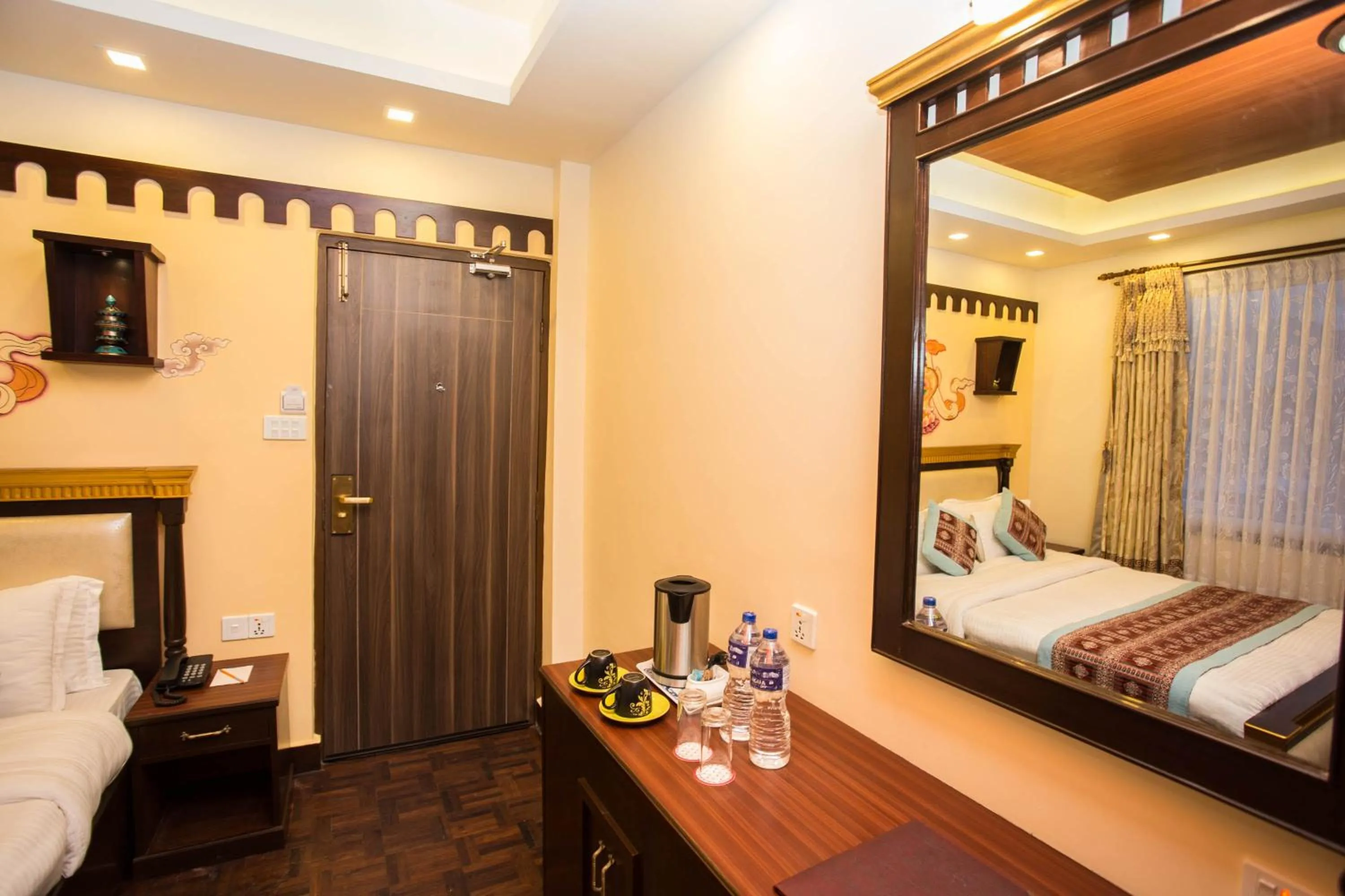 Coffee/tea facilities, Bed in Hotel Encounter Nepal & Spa