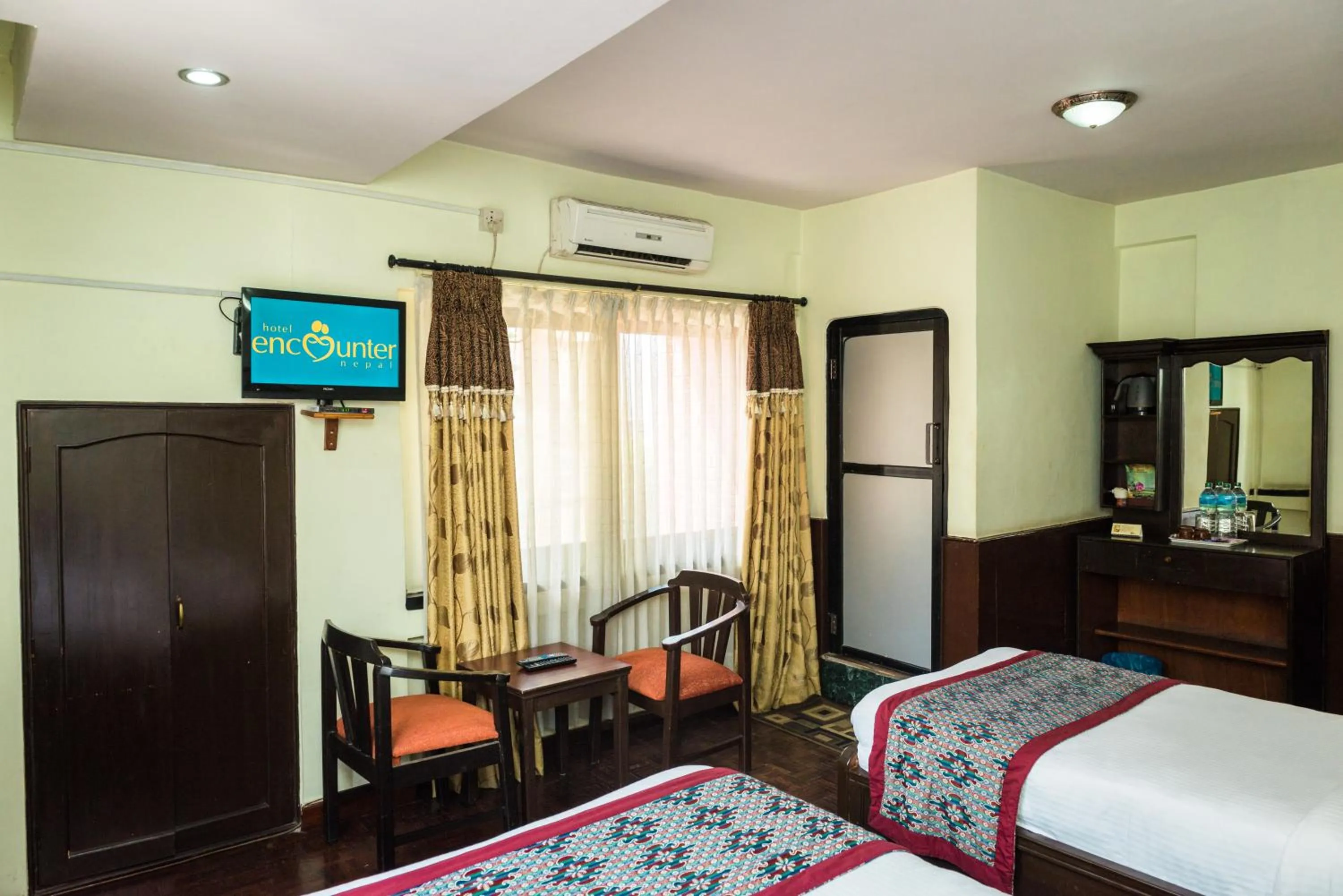 TV and multimedia, Bed in Hotel Encounter Nepal & Spa