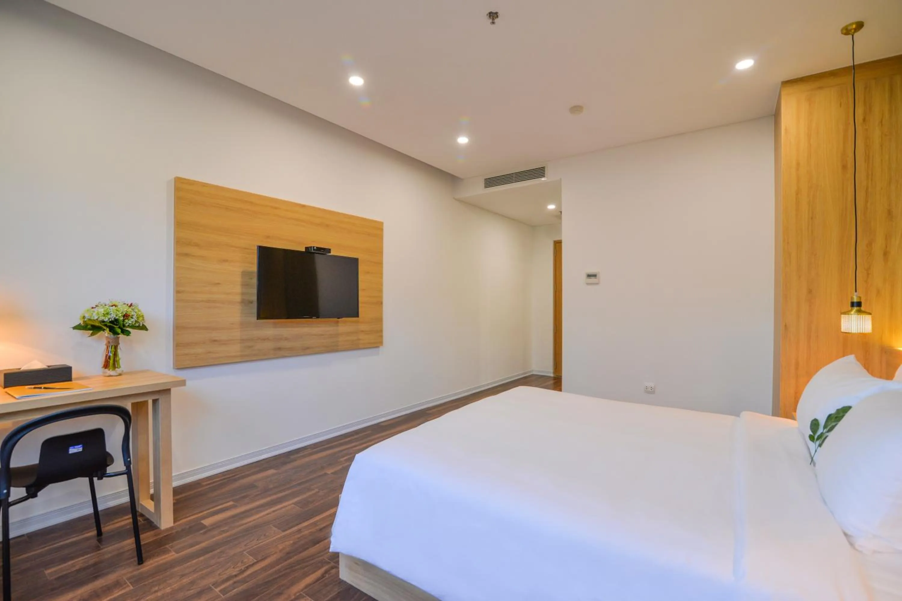 Bed in Magnolia Hotel