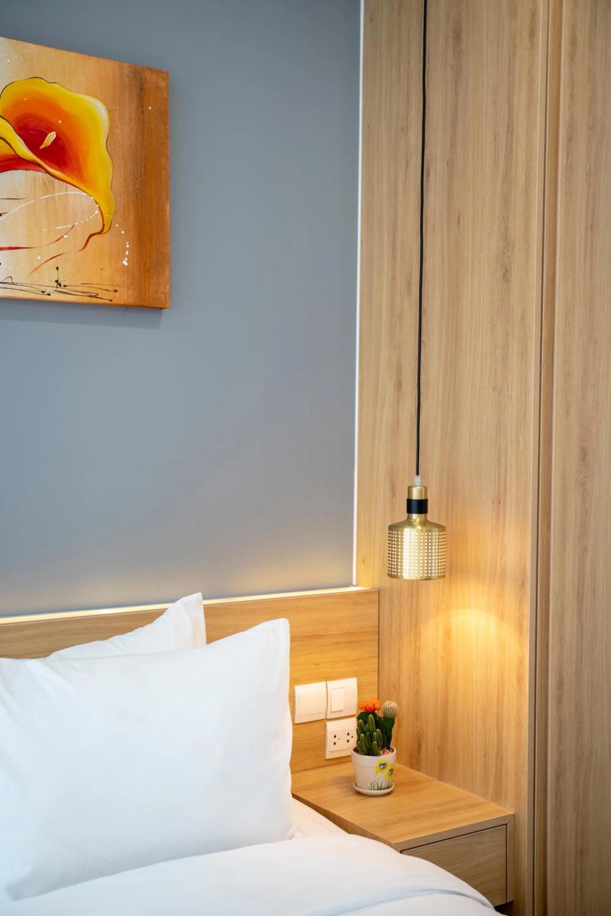 Bed in Magnolia Hotel