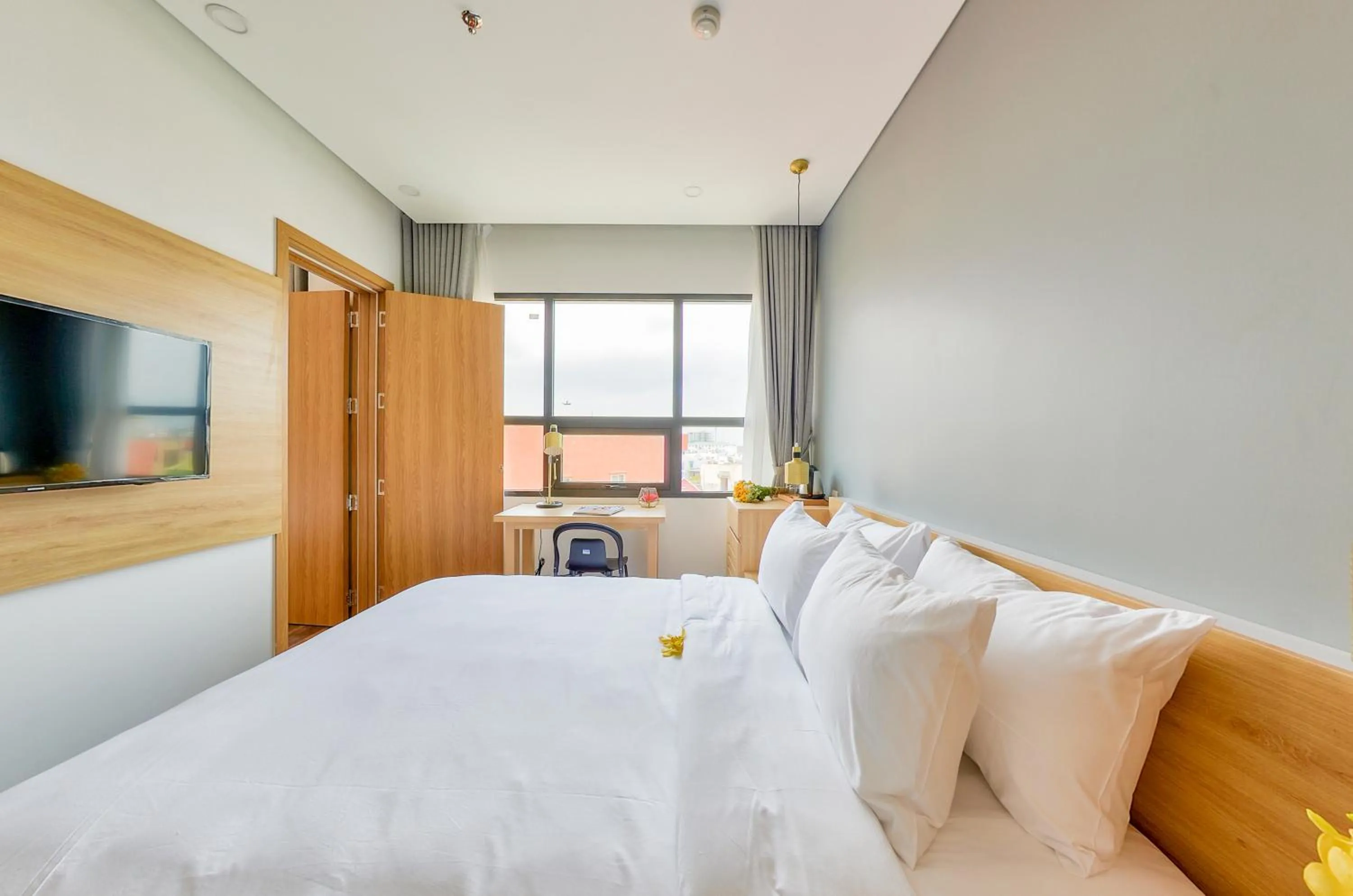 Bed in Magnolia Hotel