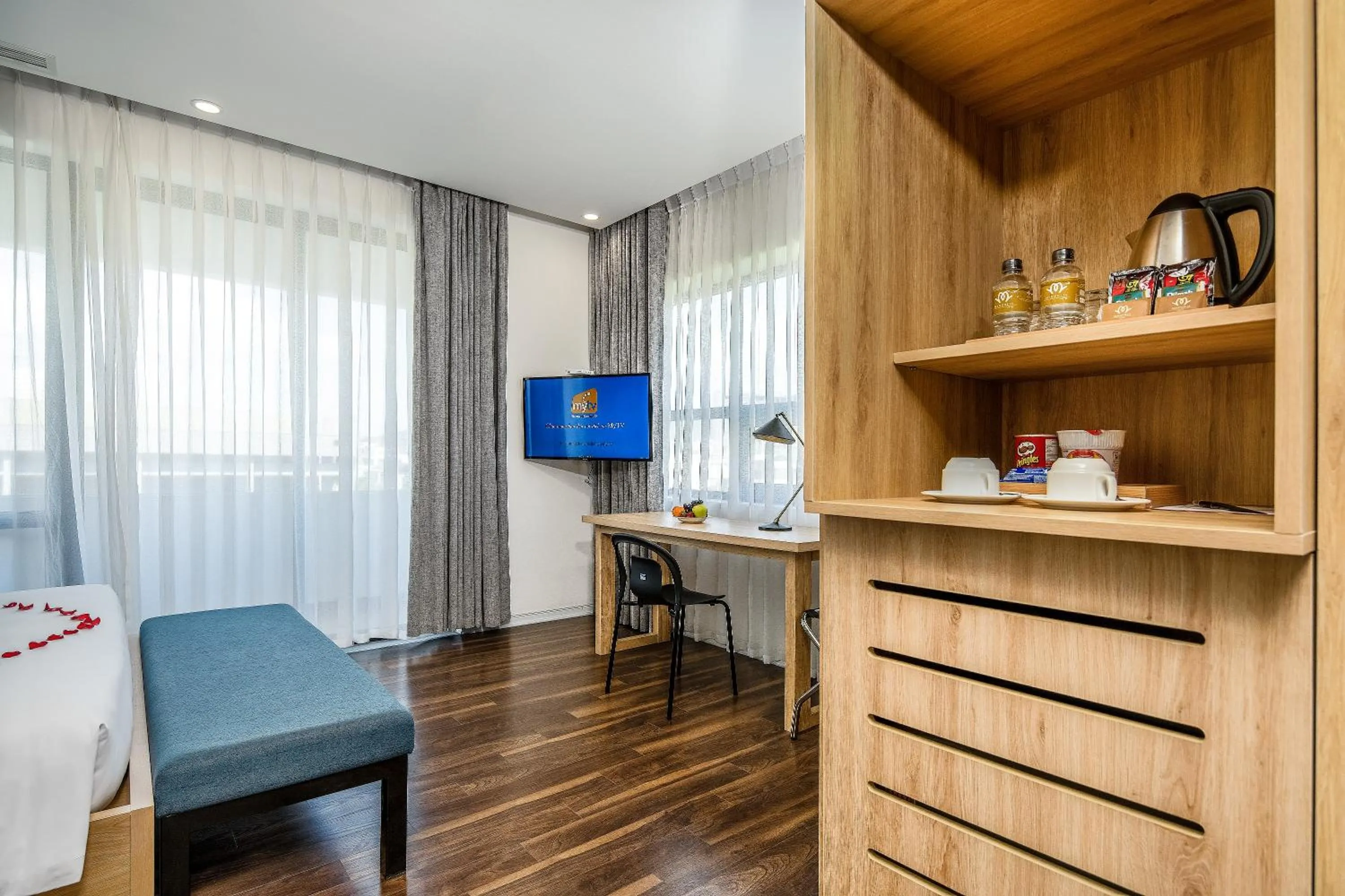 Bed in Magnolia Hotel