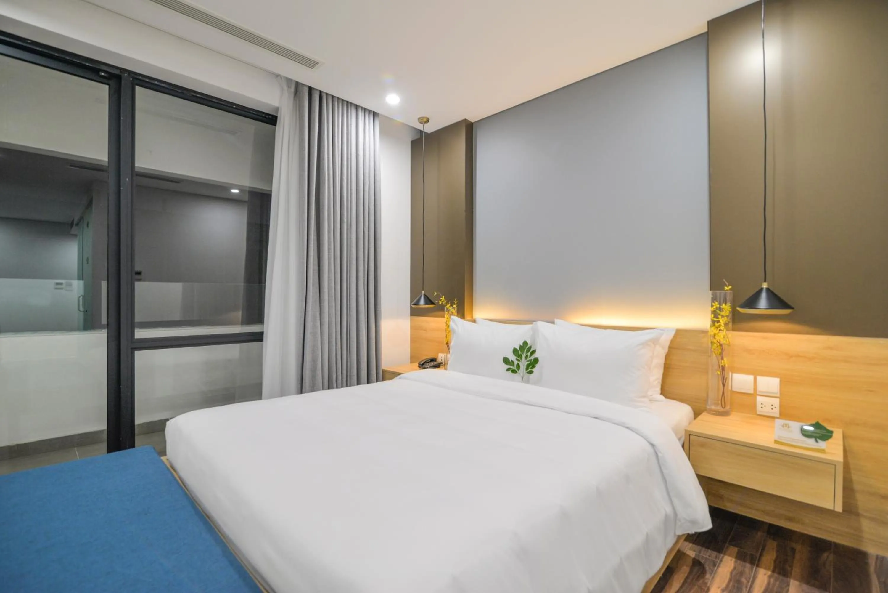 Bed in Magnolia Hotel