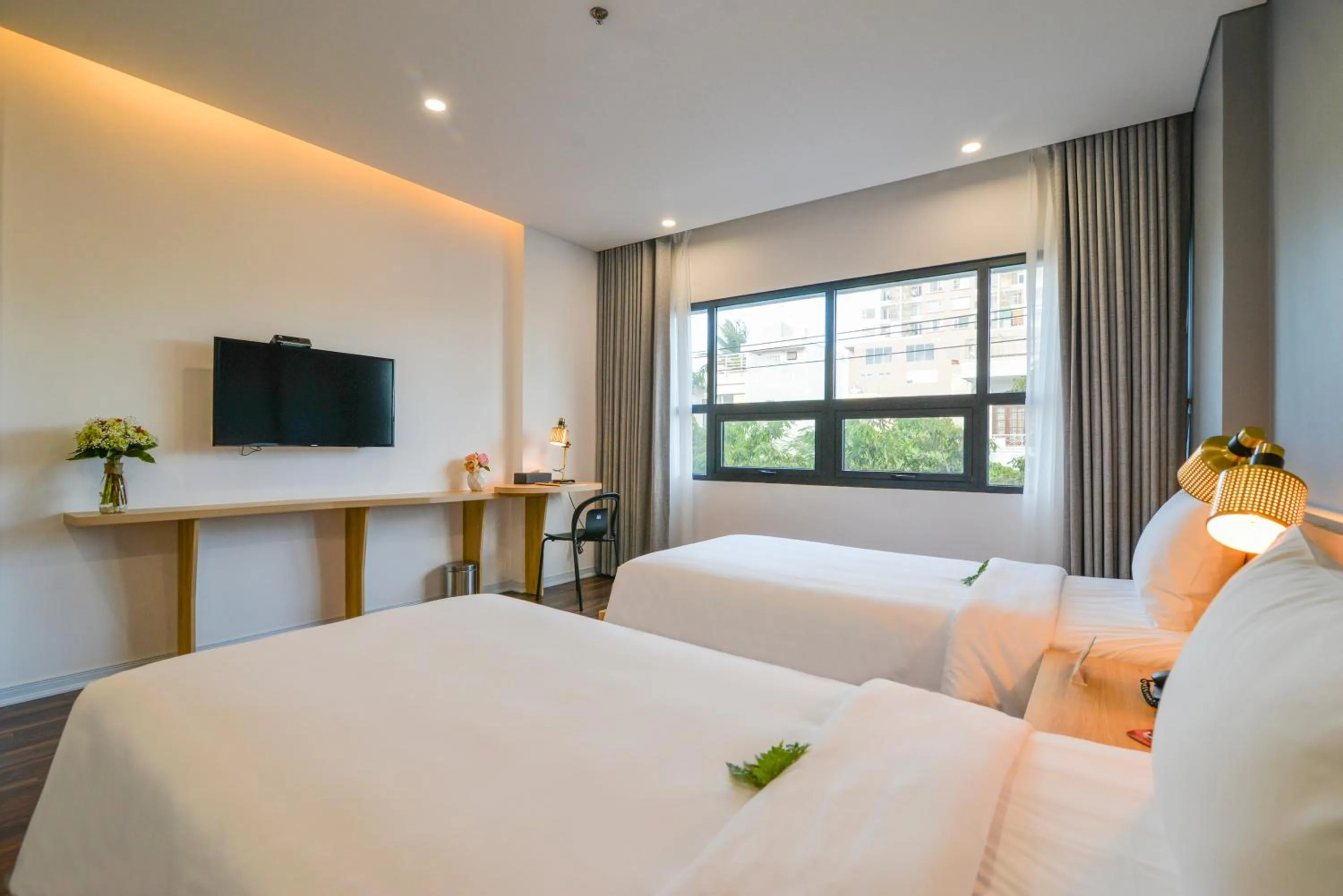 Bed in Magnolia Hotel