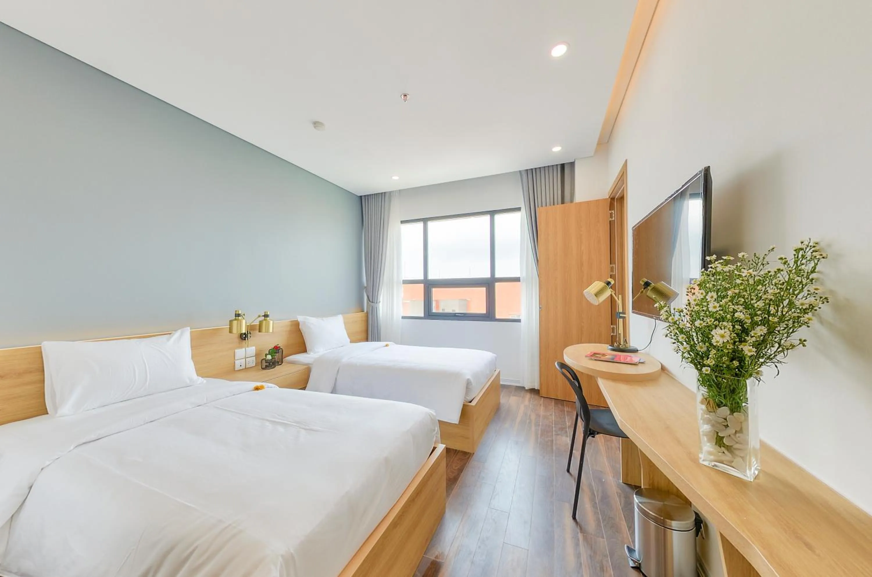 Bed in Magnolia Hotel