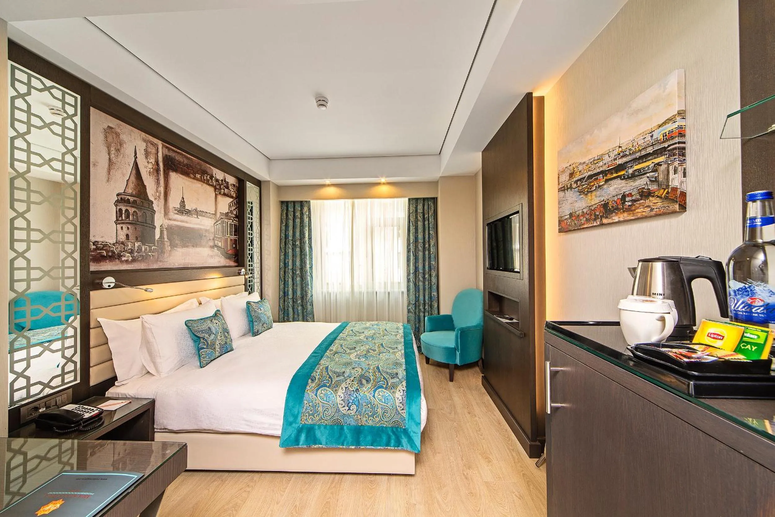 Bed in Mukarnas Taksim Hotel