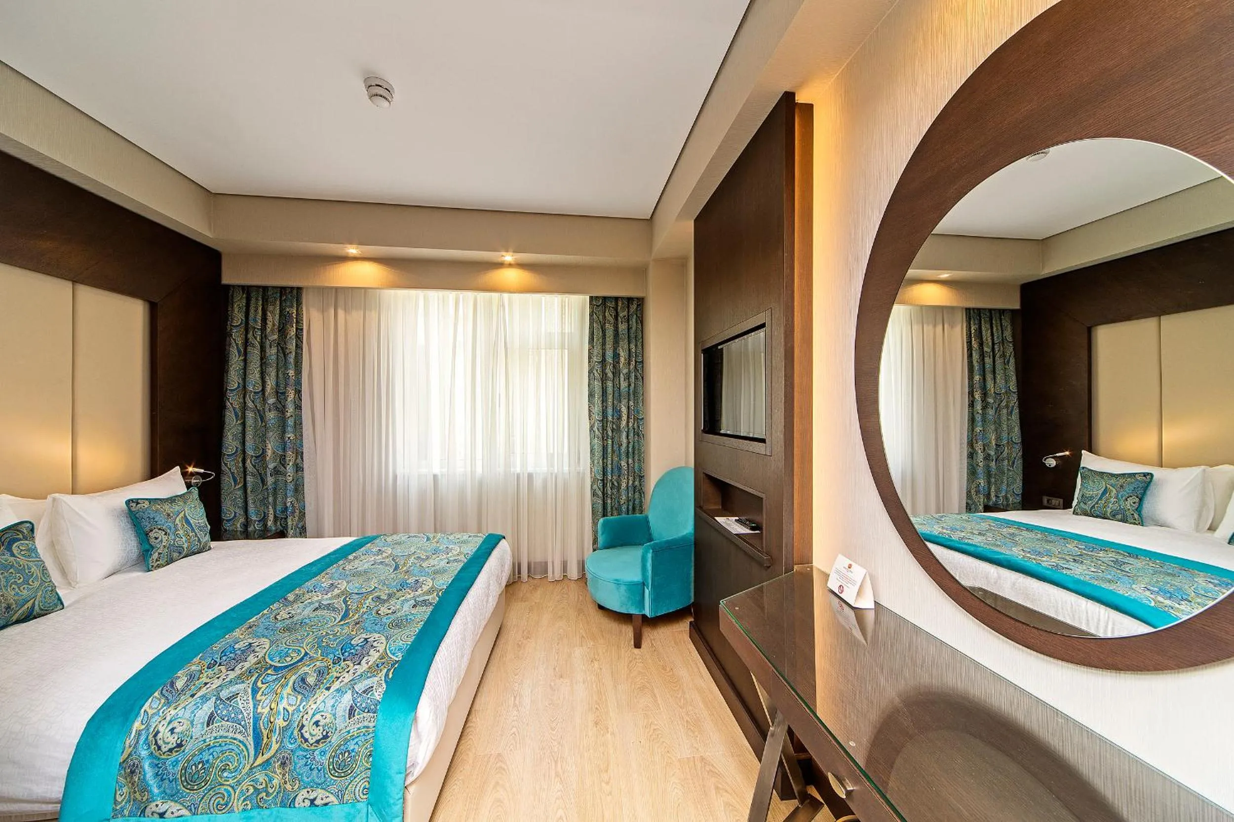 Bed in Mukarnas Taksim Hotel