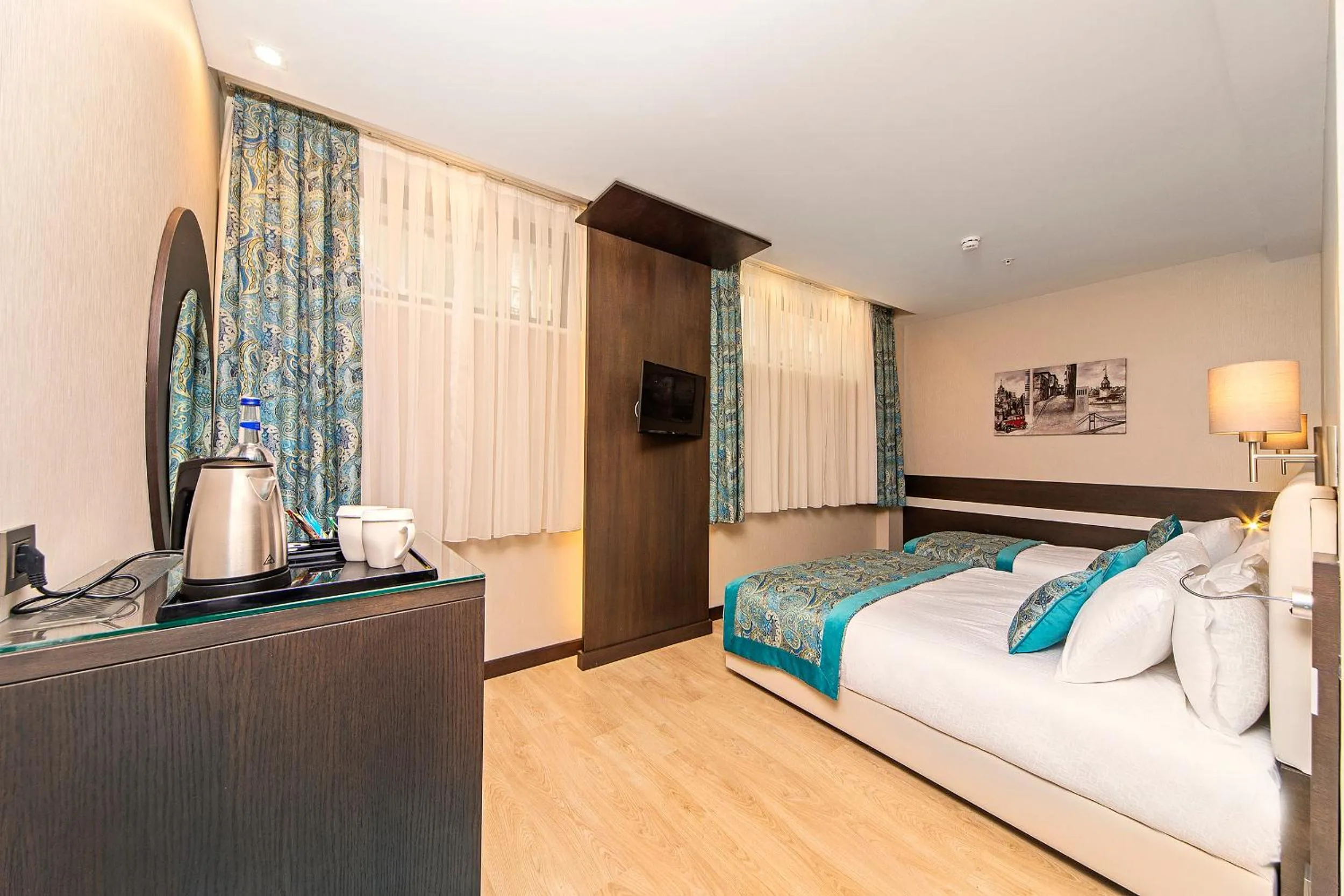 Bed in Mukarnas Taksim Hotel