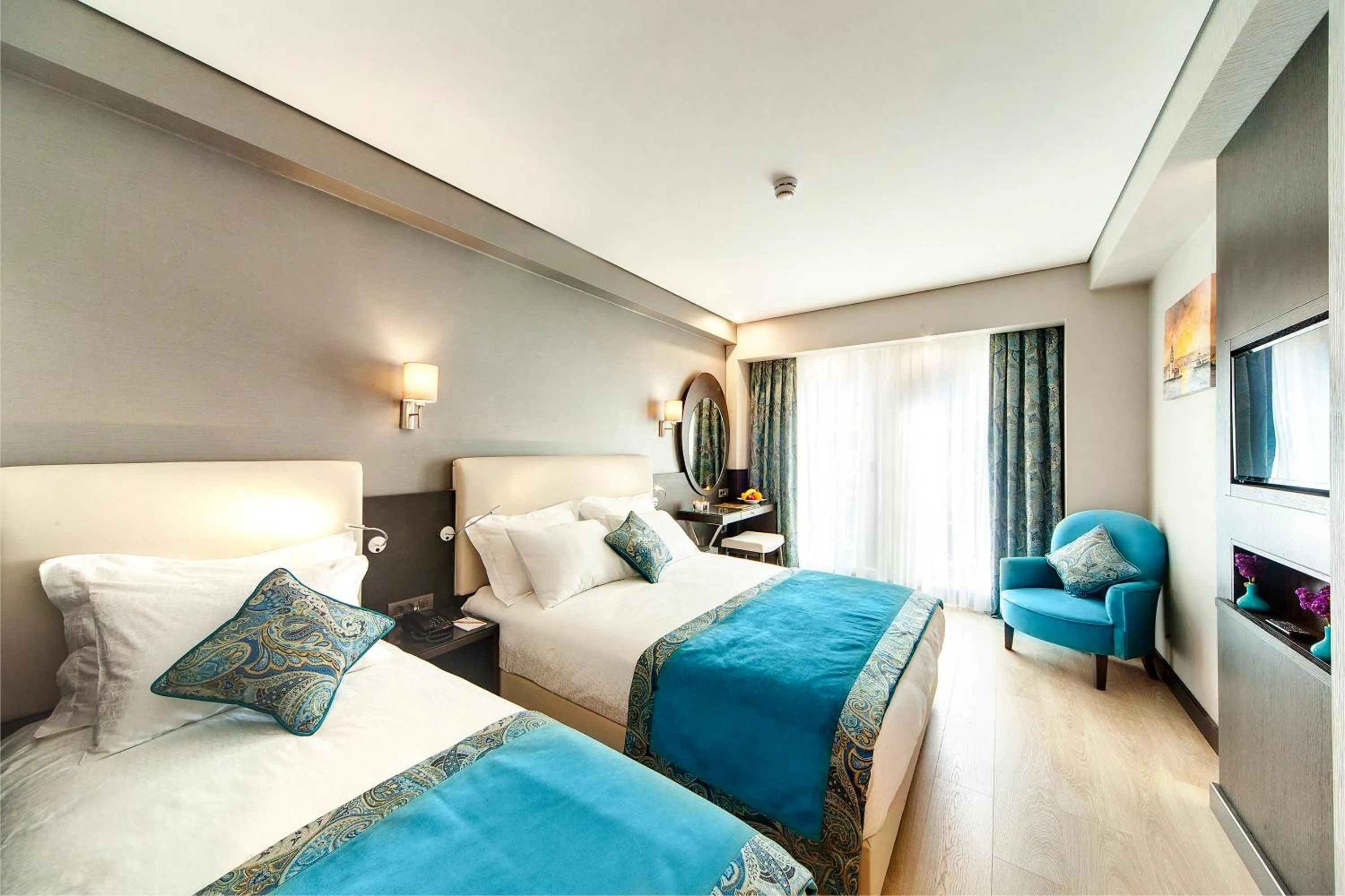 Bed in Mukarnas Taksim Hotel