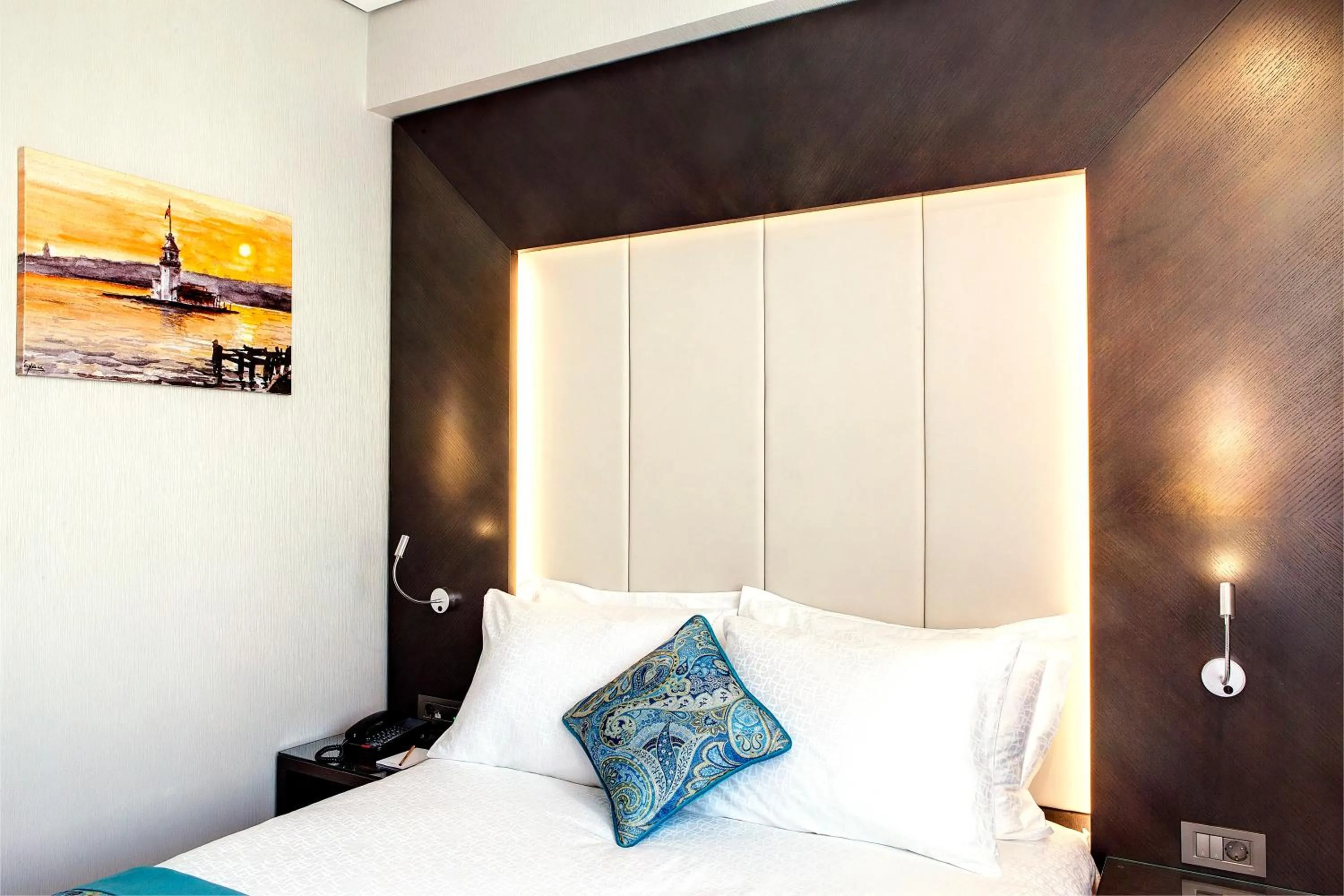 Bed in Mukarnas Taksim Hotel