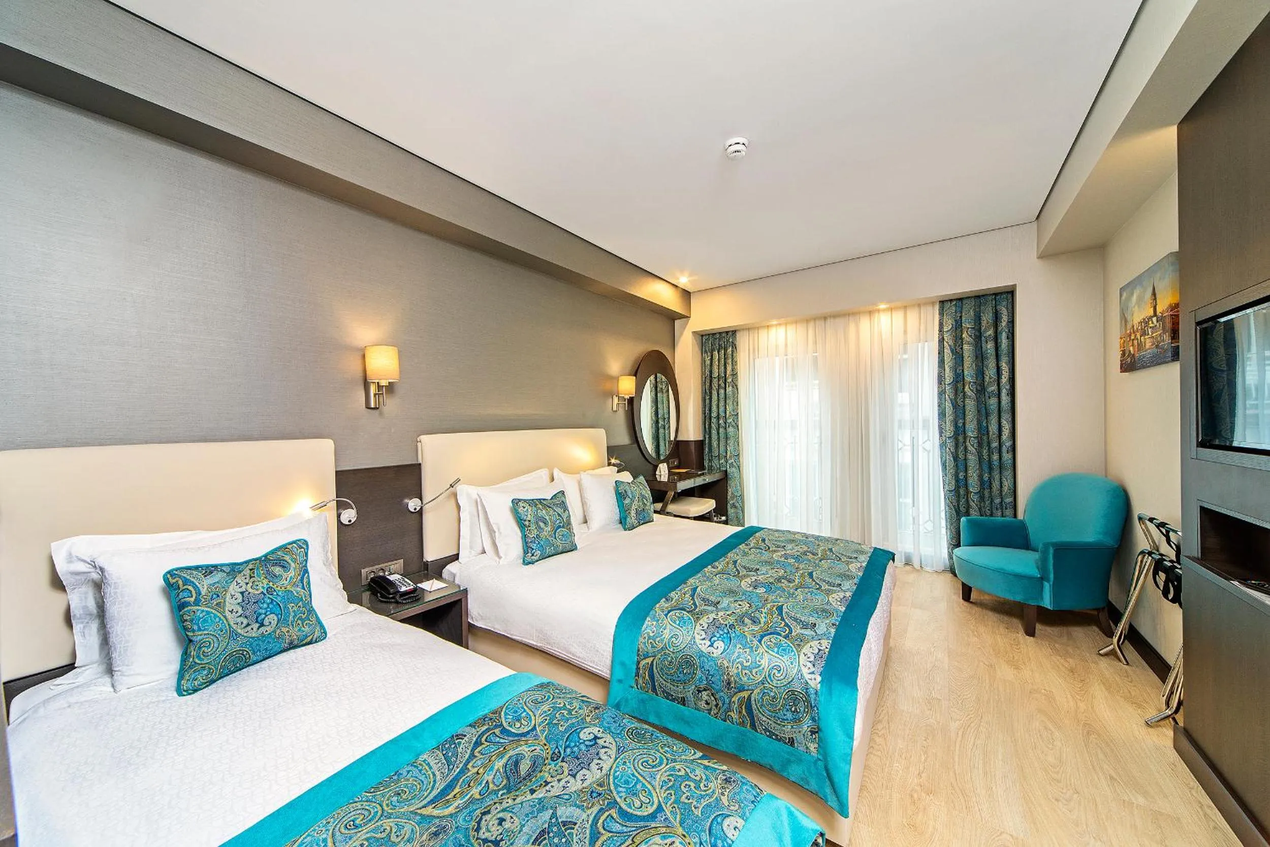 Bed in Mukarnas Taksim Hotel