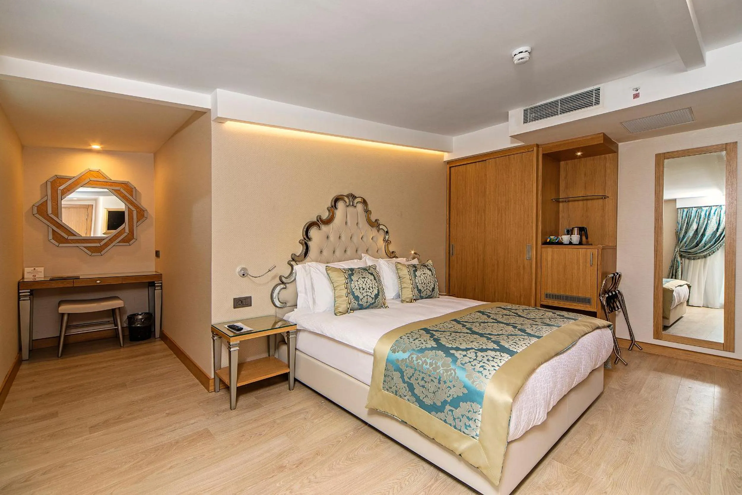 Bed in Mukarnas Taksim Hotel