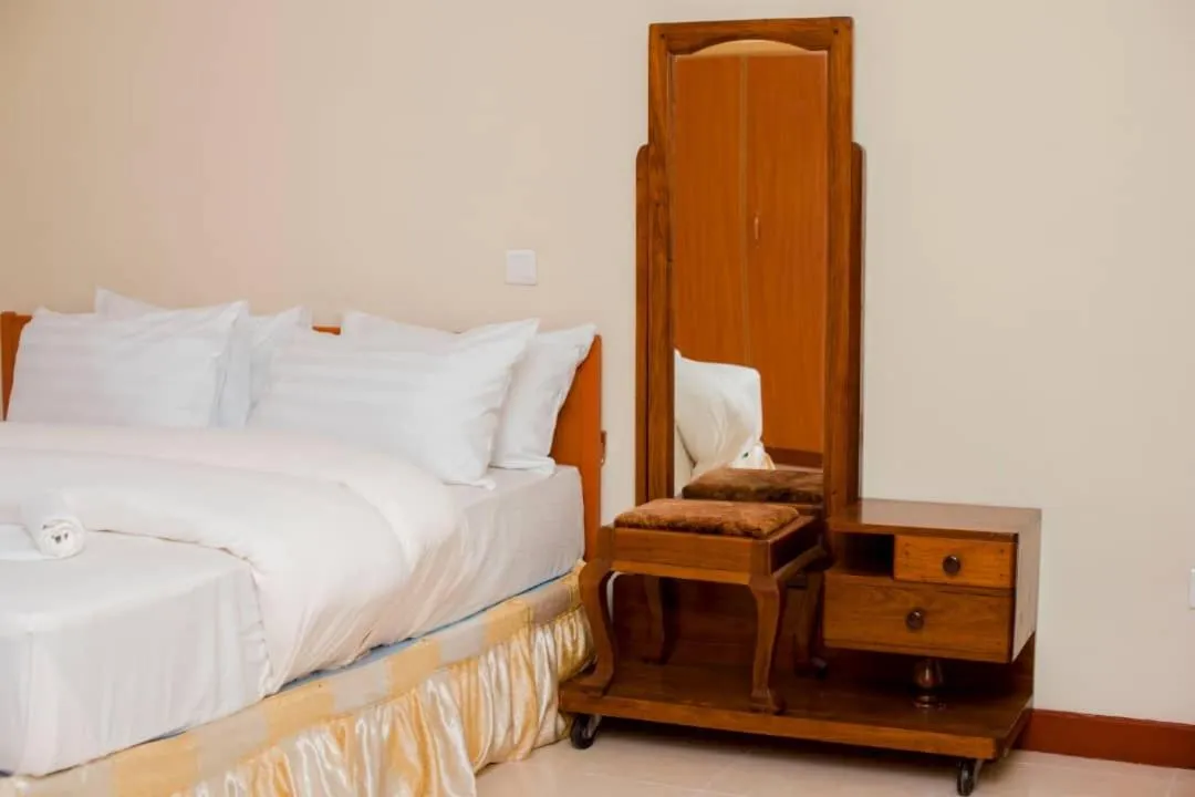 Bed in Kilimanjaro Crane Hotels & Safaris