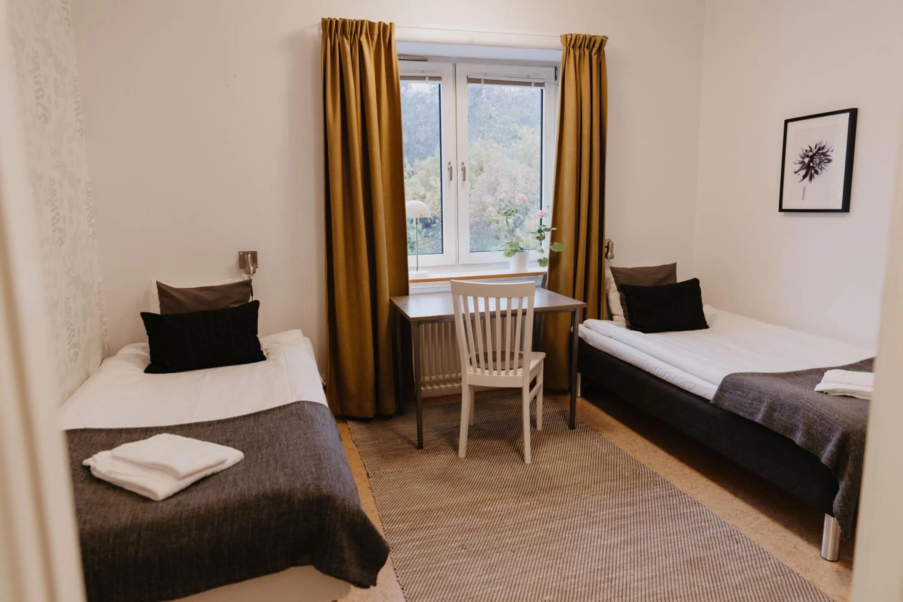 Photo of the whole room, Bed in Vassbo Vandrarhem