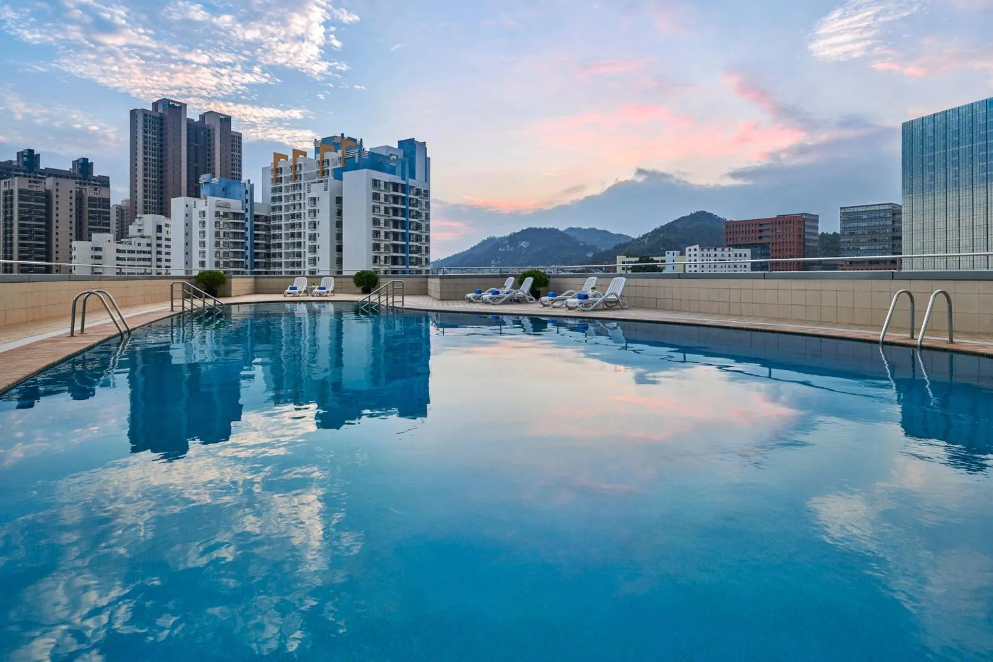 Swimming pool in Crowne Plaza Zhuhai City Center by IHG