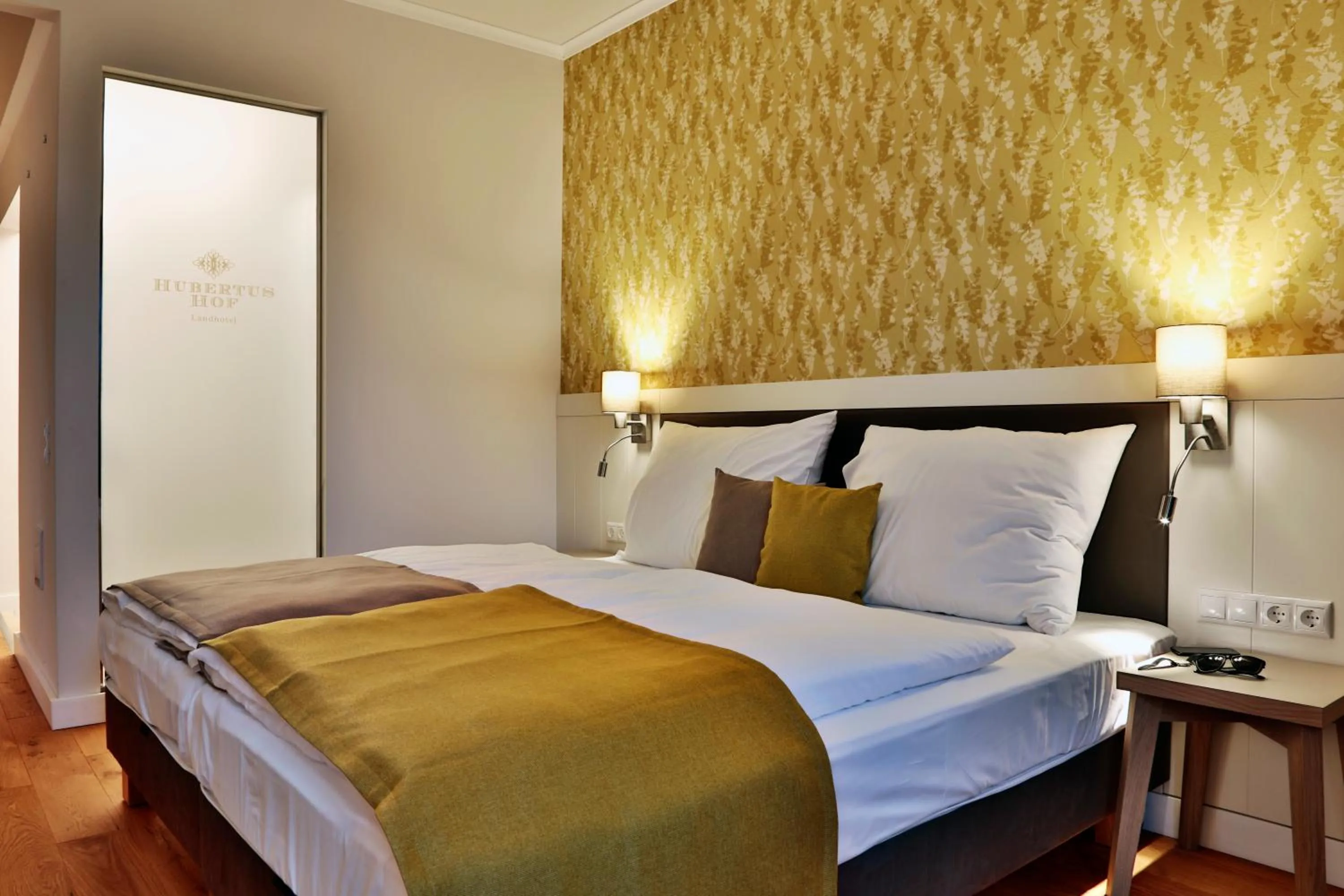 Bed in Hubertus Hof Landhotel