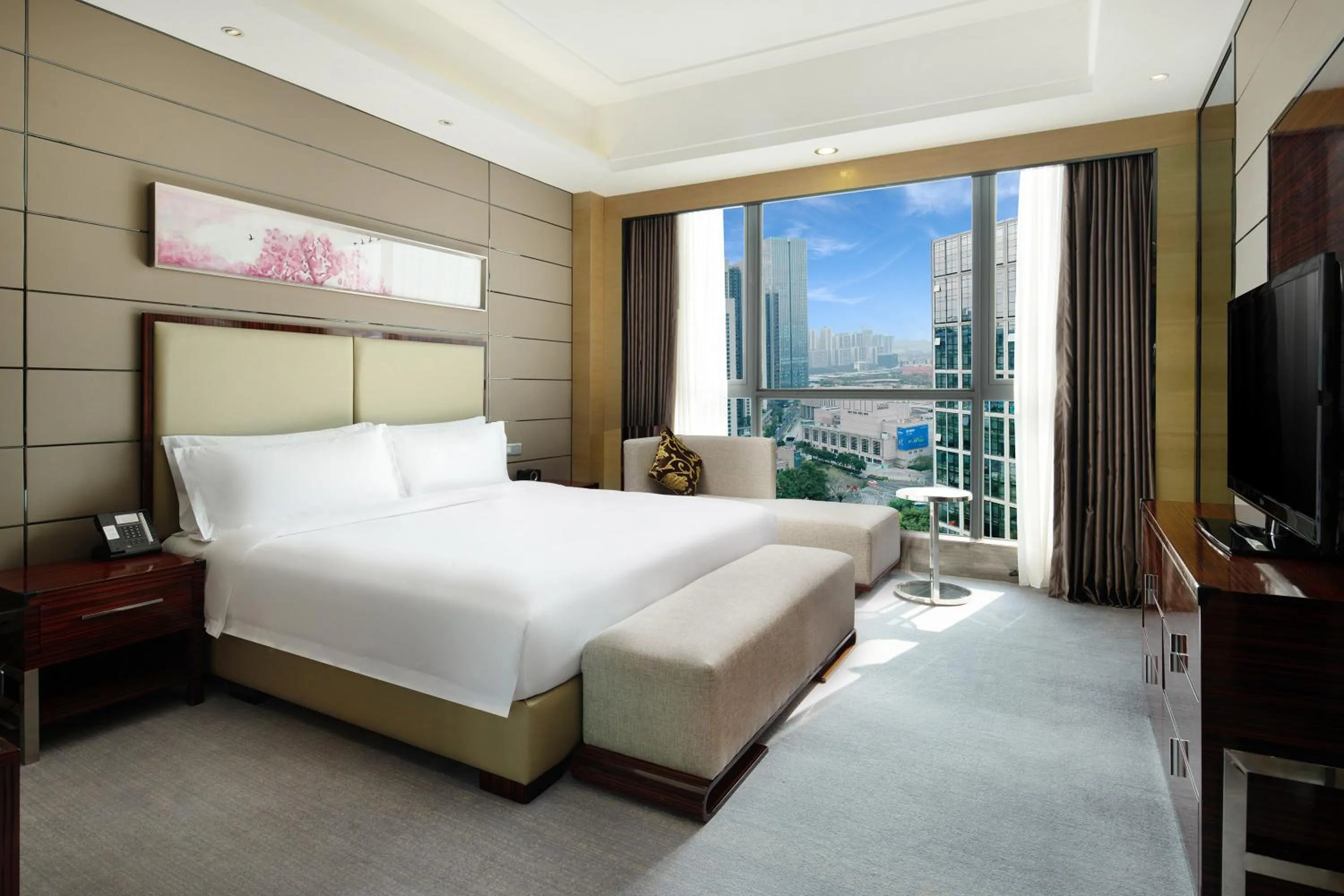 Photo of the whole room, Bed in Crowne Plaza Shenzhen Longgang City Centre by IHG